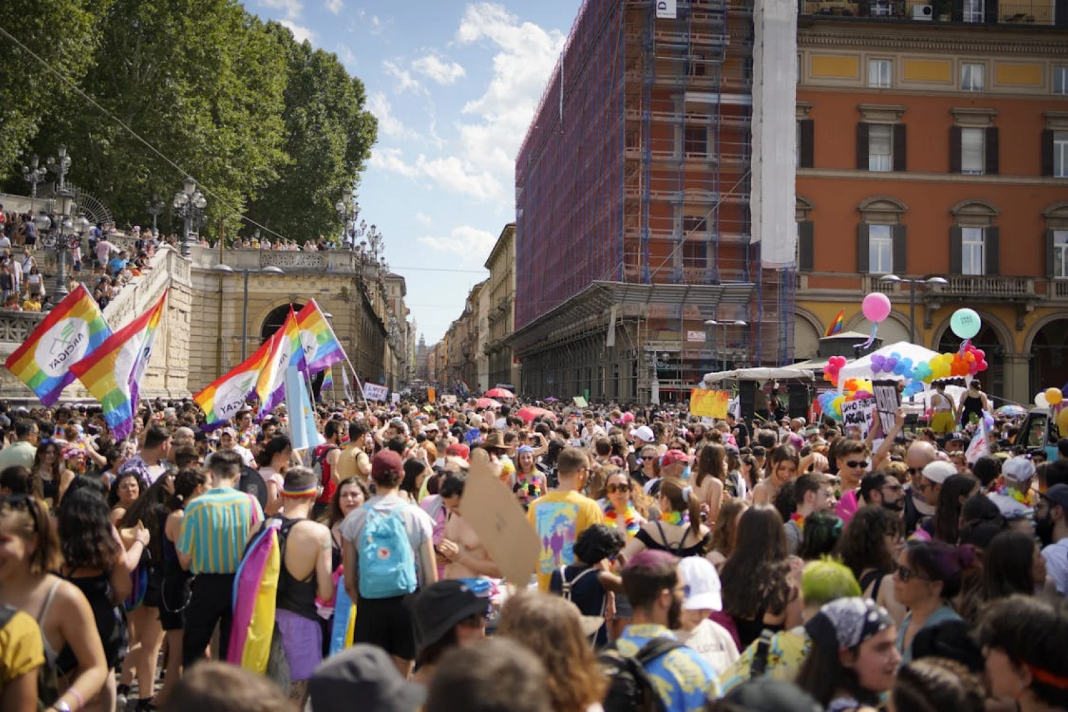 People at a Pride parade in Bologna, Italy