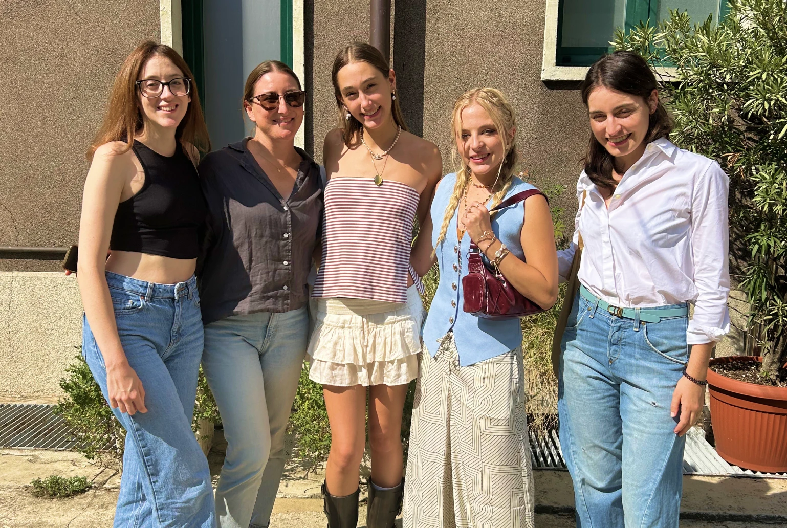 Evie with Cambria and new friends in Milan