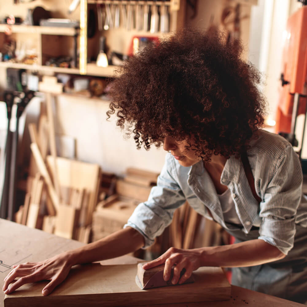 Small Business Loans lady in woodshop