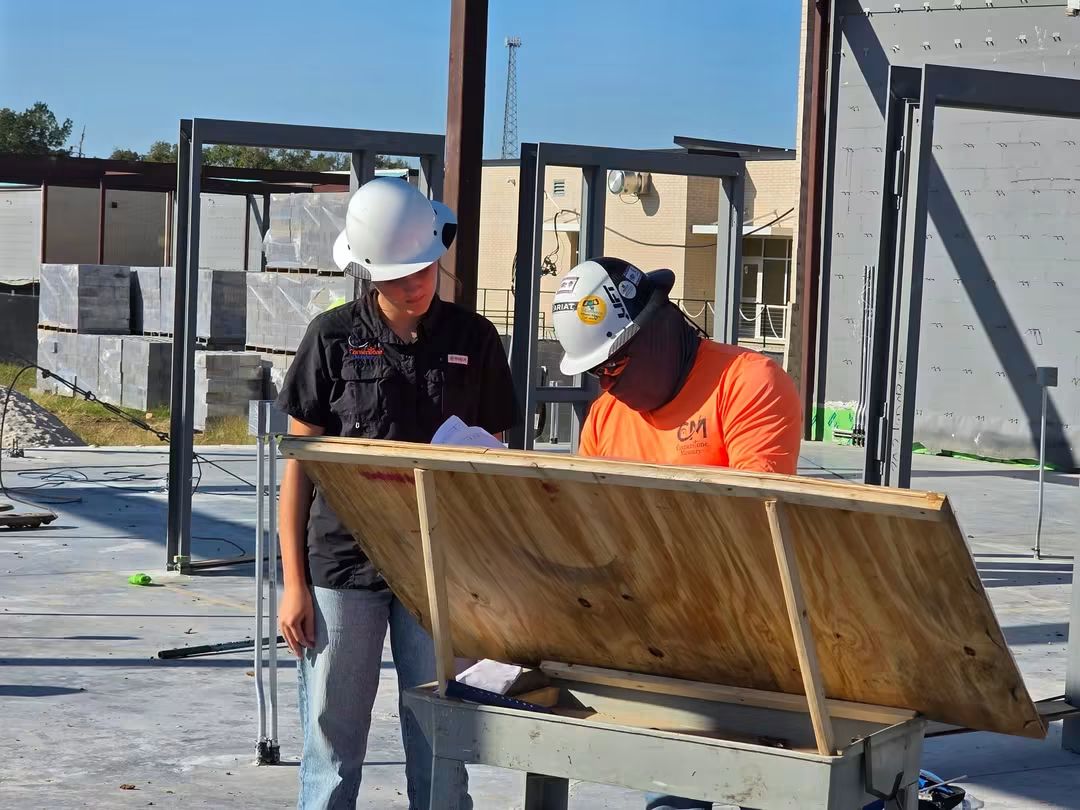 The Cornerstone Masonry team coordinates project details on-site to keep work moving smoothly.