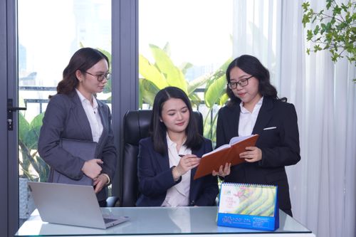 Yogi CPA's employees alongside Zunie (CEO of the company)