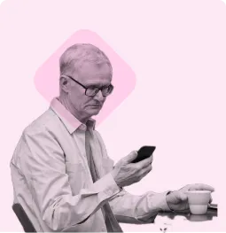 old man with mobile and coffee