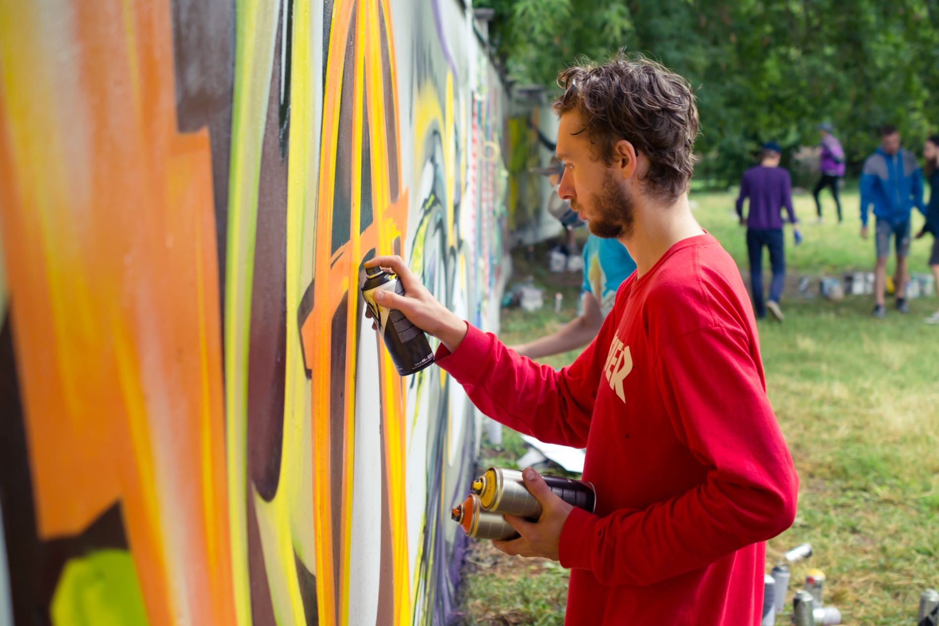 Creatieve graffiti workshop van BuitenBusiness tijdens een teamuitje