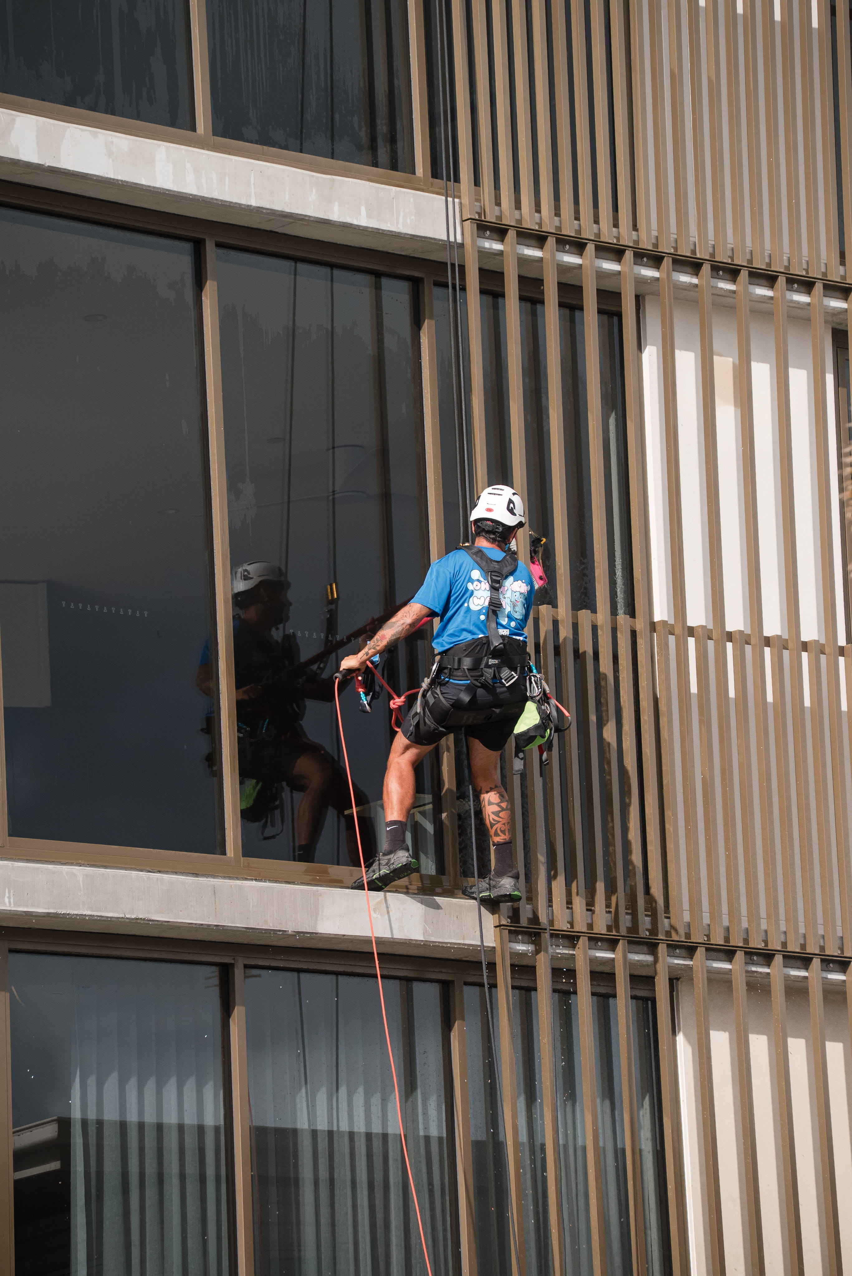 High-access window cleaning on multi-storey building Gold Coast