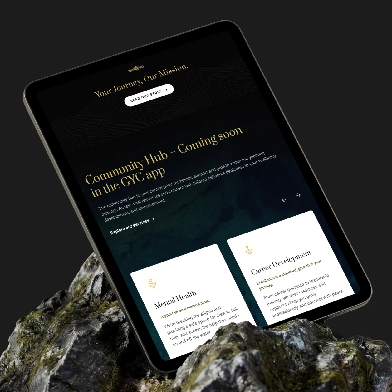 Tablet showing a community hub app screen with Mental Health and Career Development info on a rock background.