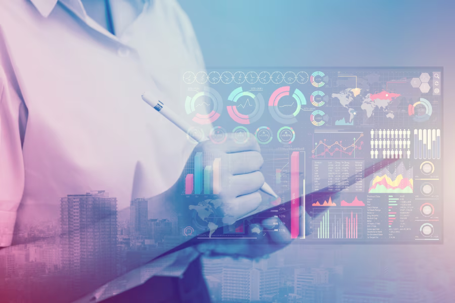 Businesswoman focused on a tablet displaying graphs and data, discussing ways for consulting firms to scale sustainably.