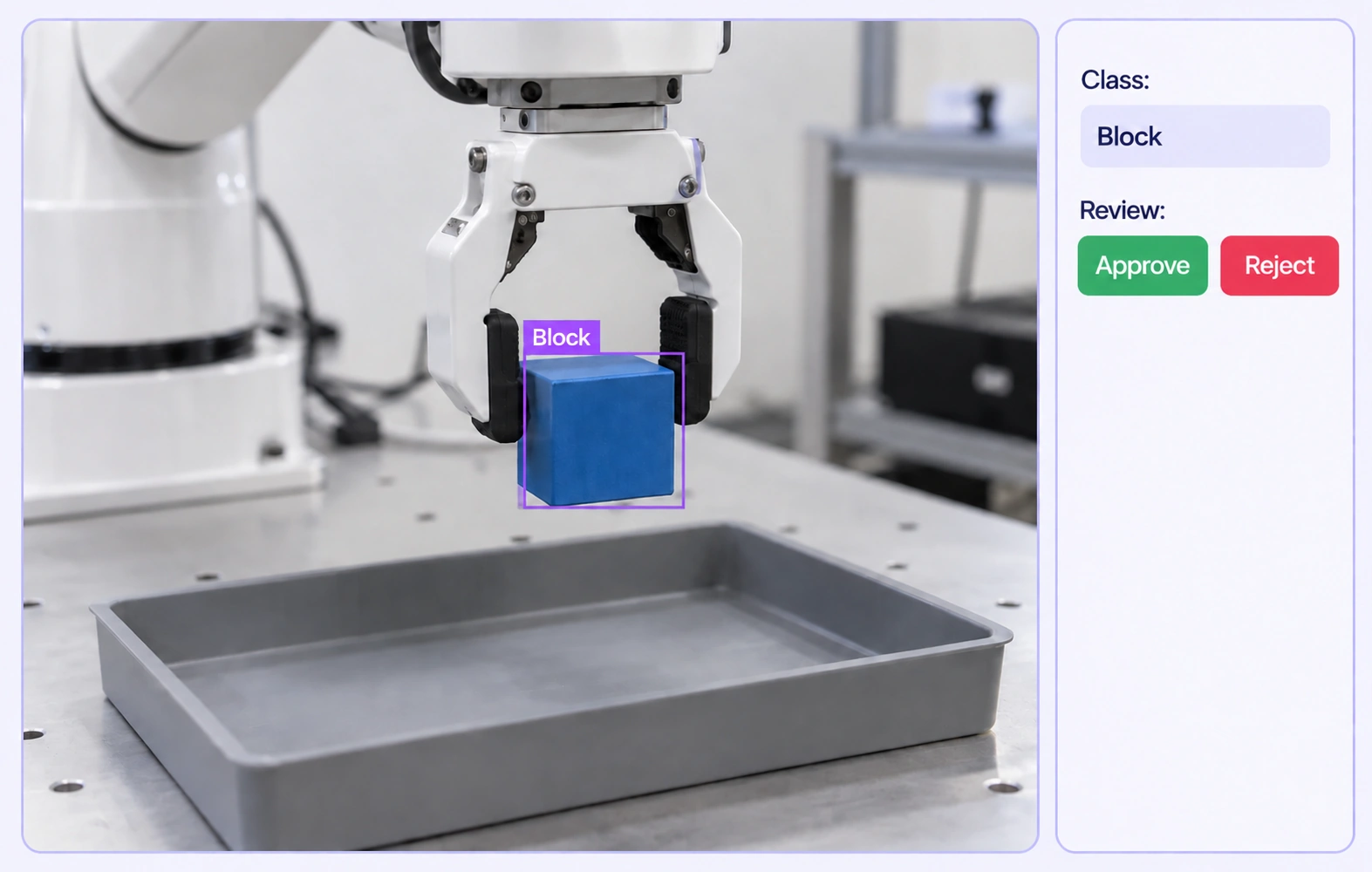 A reviewer inspects a blue-block annotation in a recorded robot demonstration. A reviewer inspects a blue-block annotation in a recorded robot demonstration.