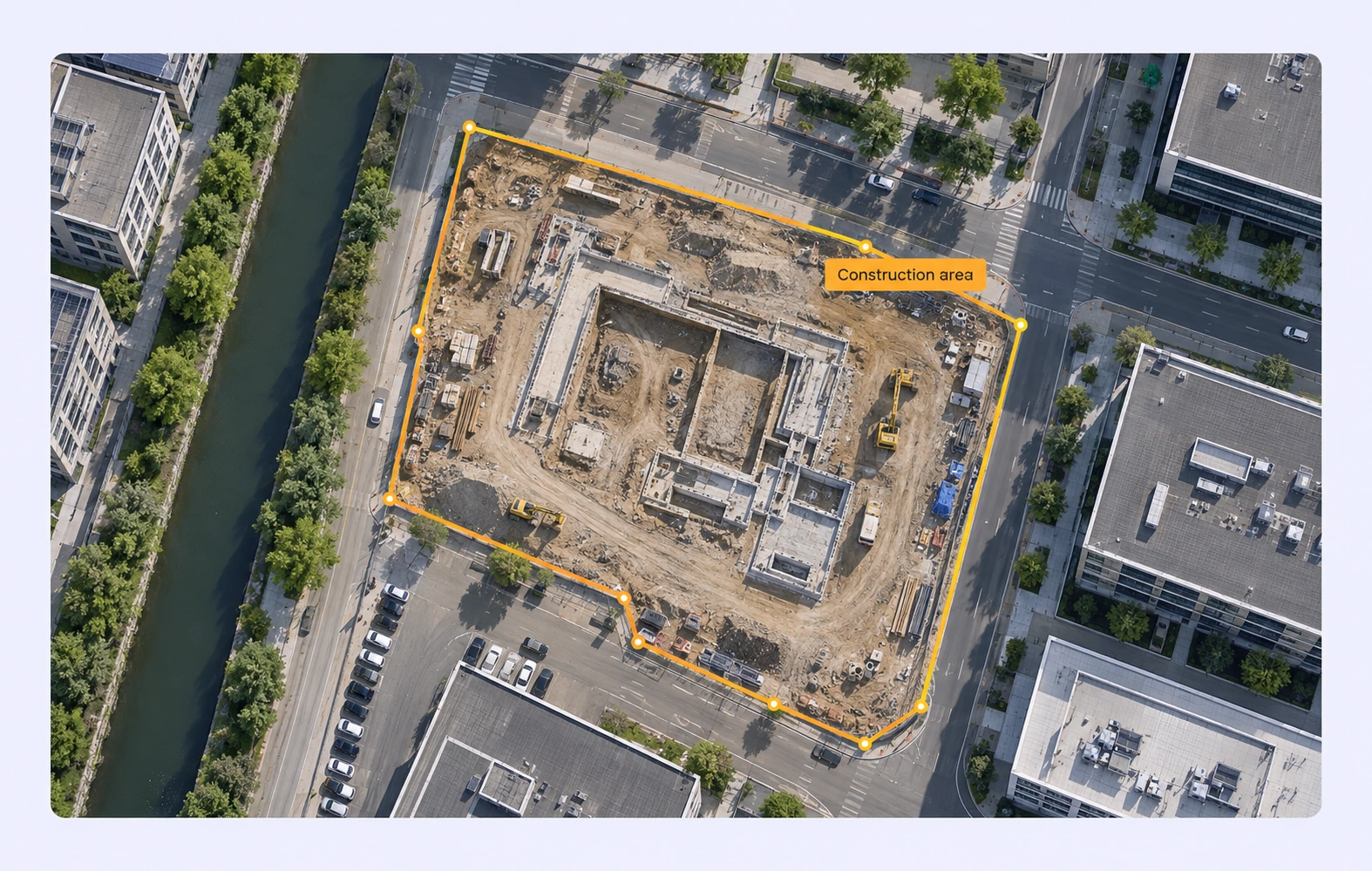 Aerial construction-site footprint outlined as an annotation region.