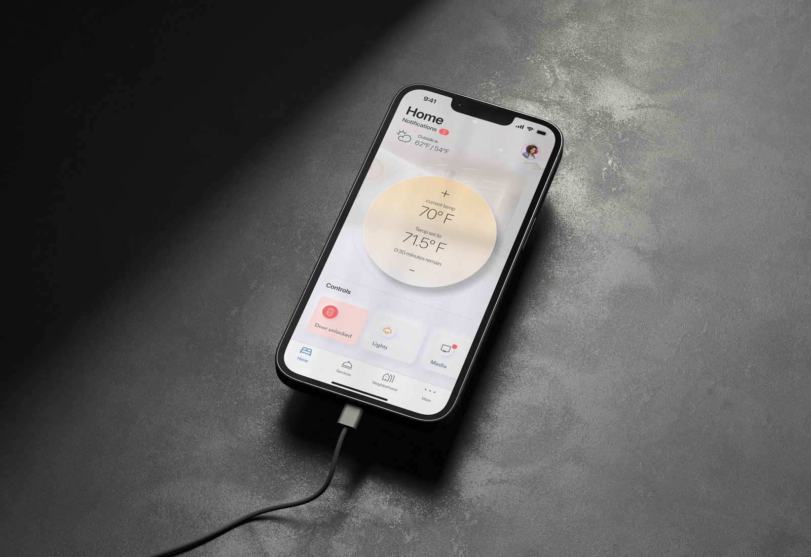 an iPhone with a home control app offering to change the temperature in the home as well as indicating a door is unlocked and you can control your lights and media.