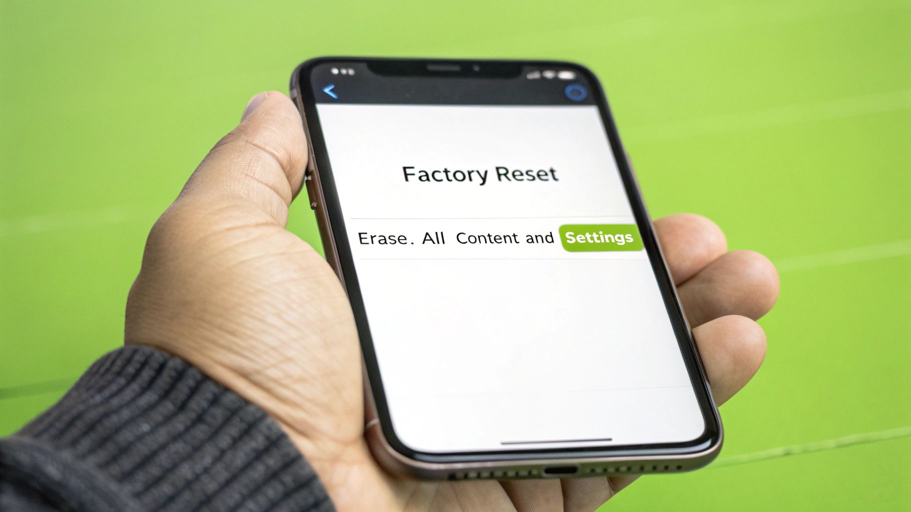 An iPhone displaying the 'Erase All Content and Settings' screen, ready for the final wipe.