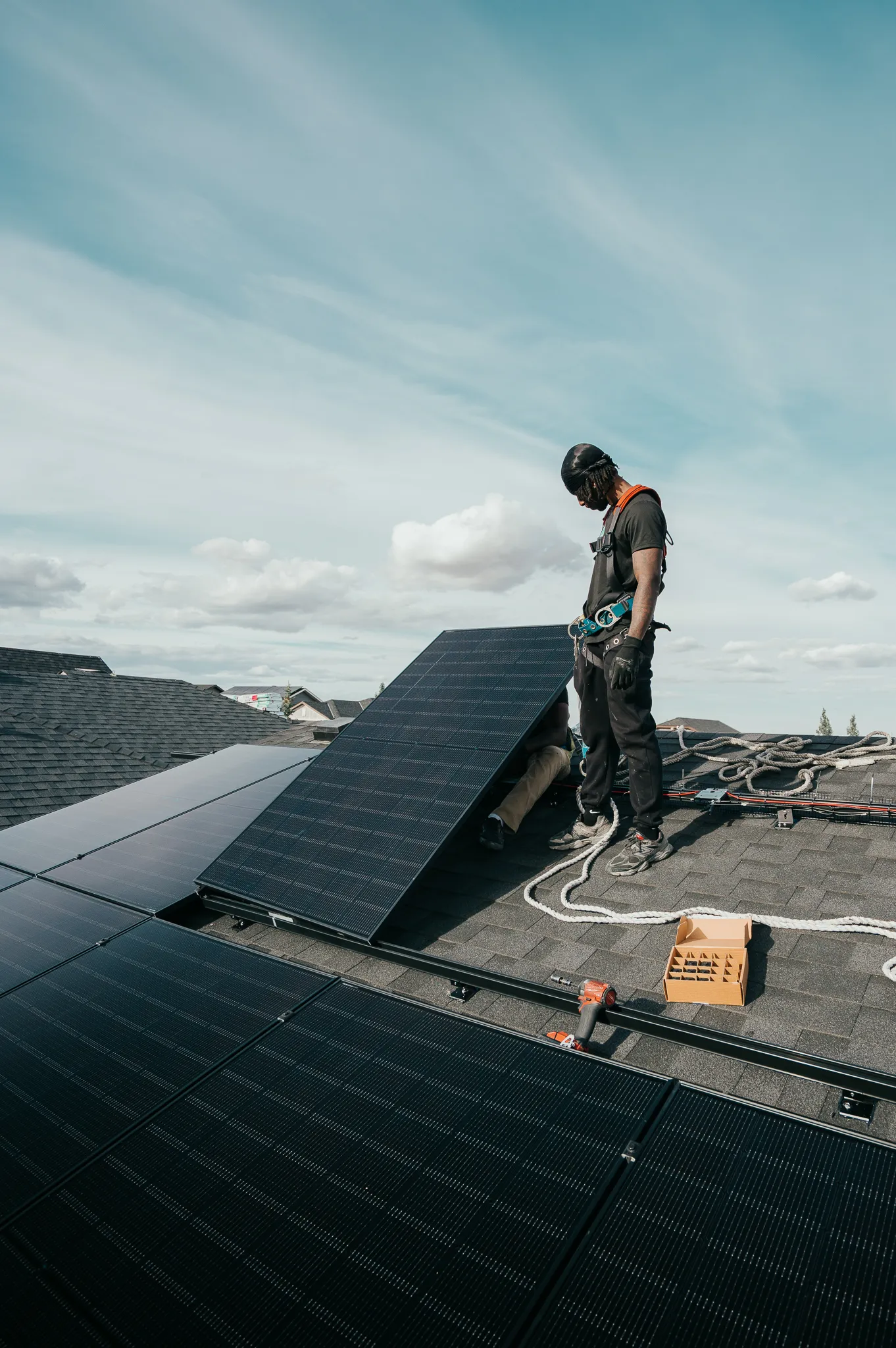 Orizon Installer Mounting Solar Panels On A Home