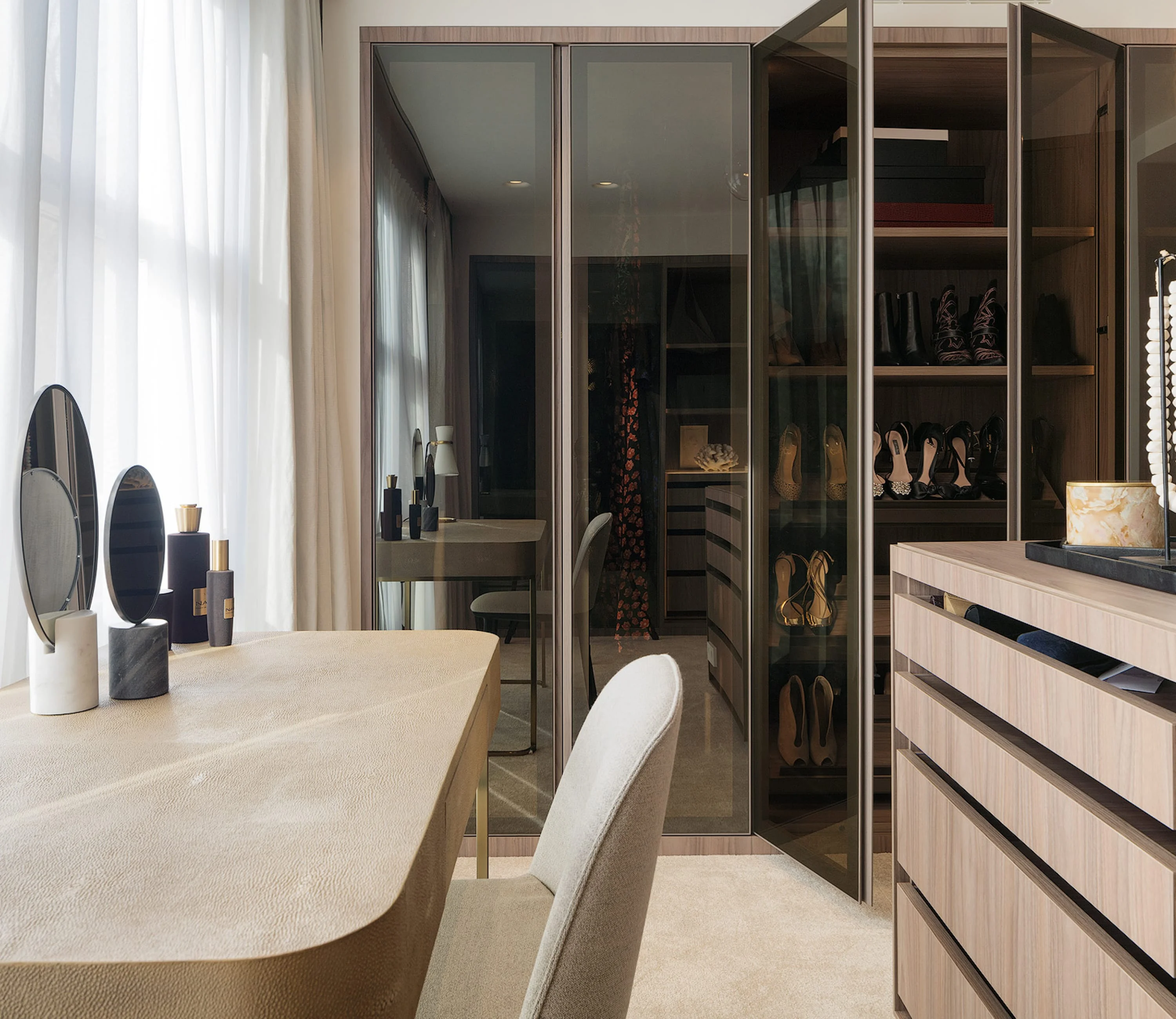 A "beautiful closet image in a room" typically refers to a photograph or visual representation of an aesthetically pleasing and well-designed closet or wardrobe situated within a room. This image showcases the combination of functional storage and stylish design within a living space.