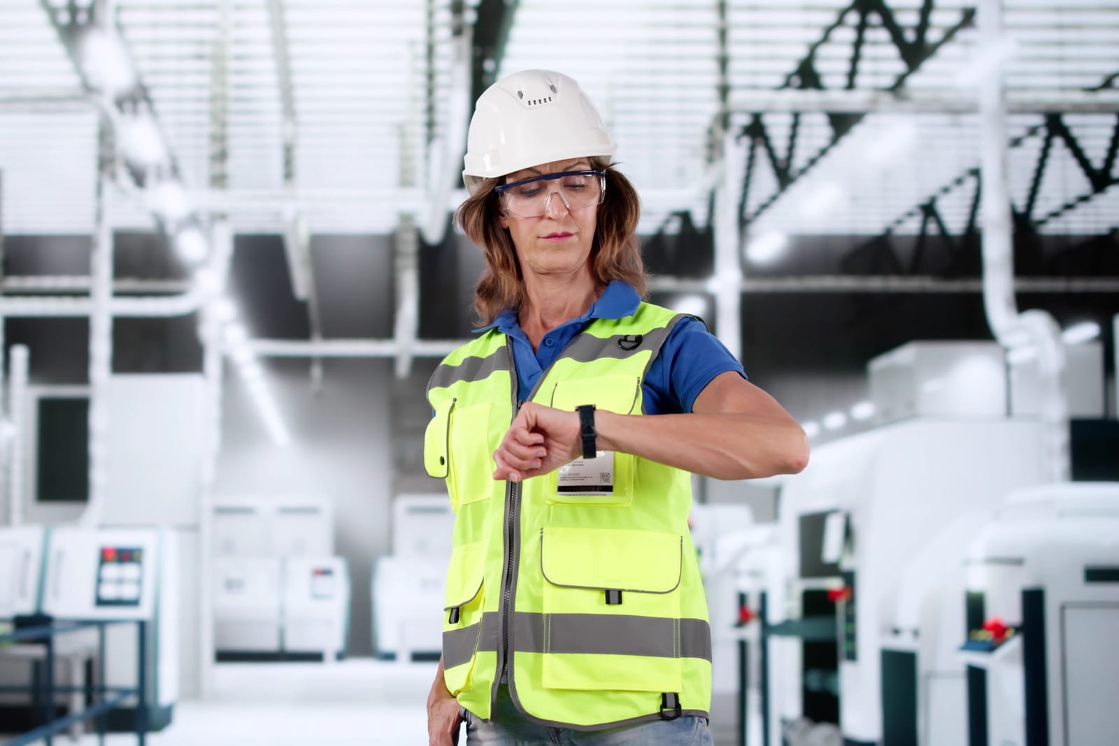 A stressed worker checking clock during work hours