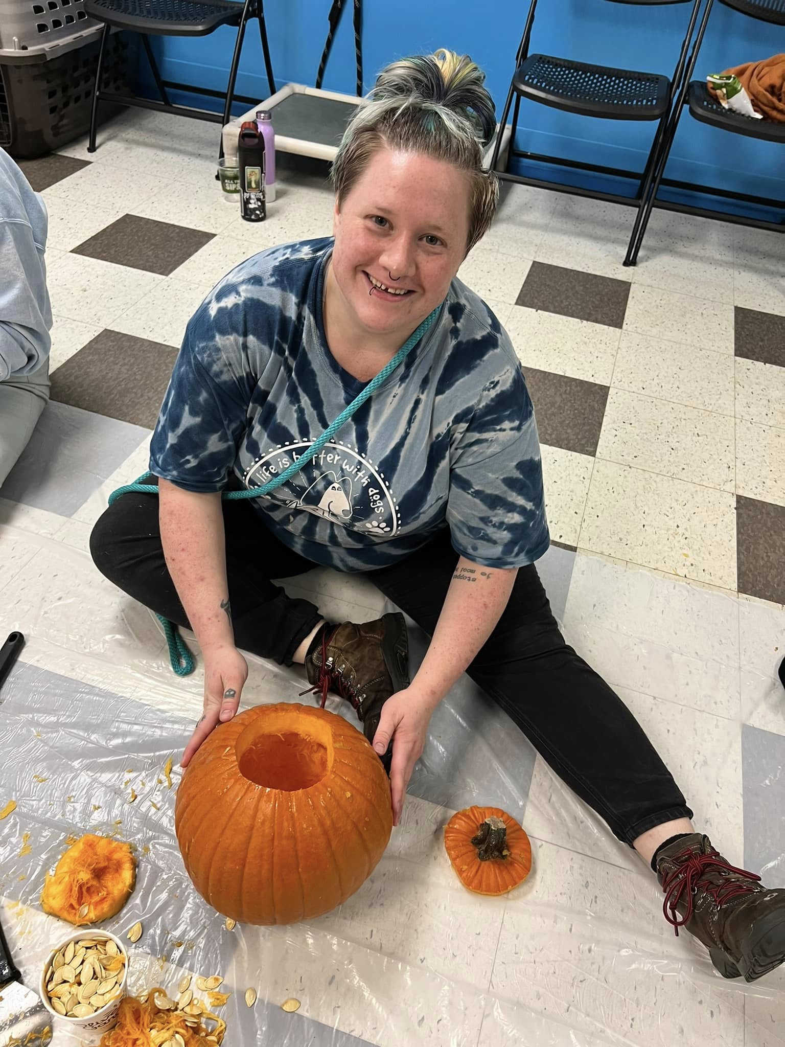 A happy corgi mix enjoying daycare at Kim's K-9's boarding facility