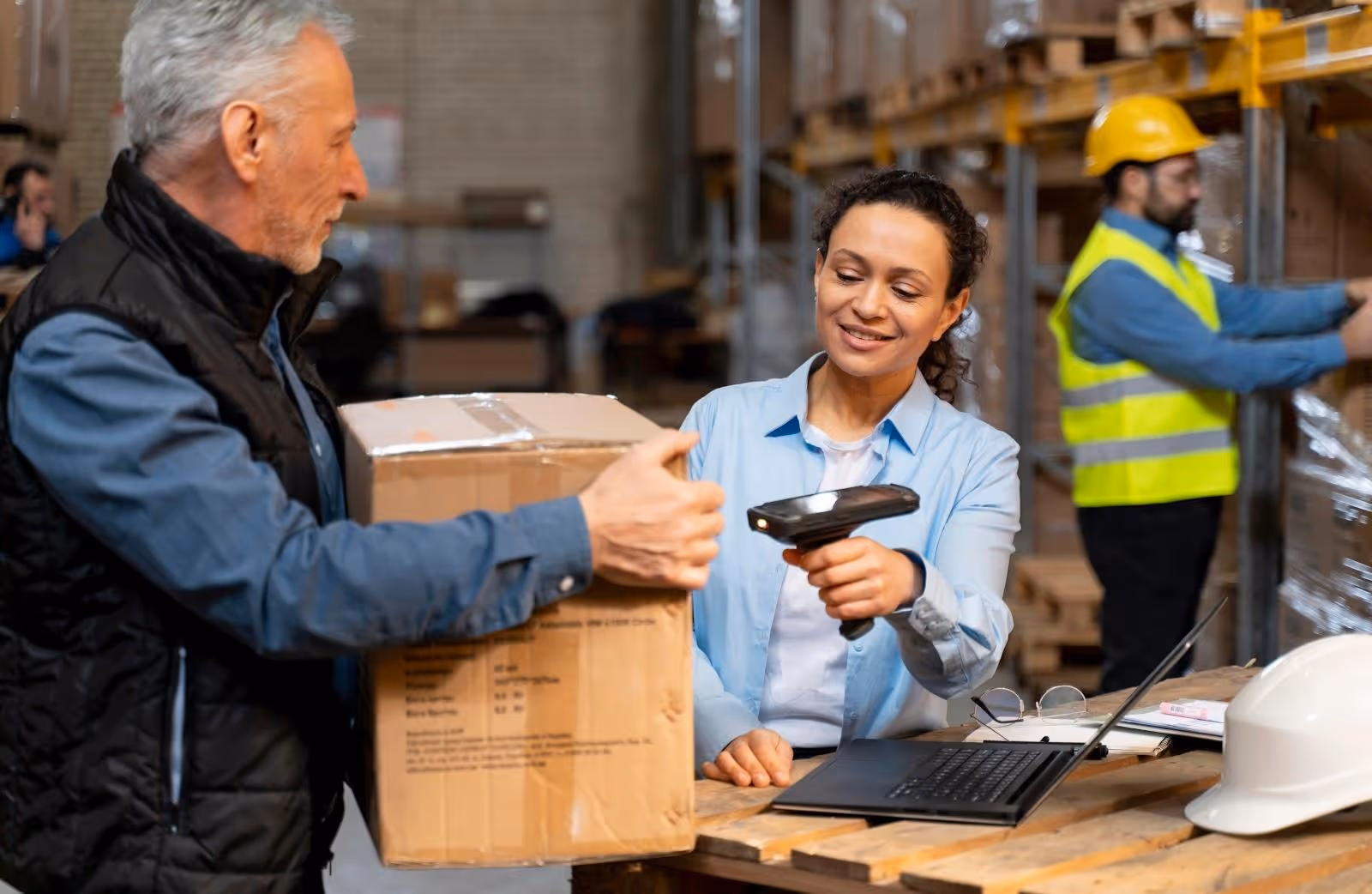 A man and a woman processing an order