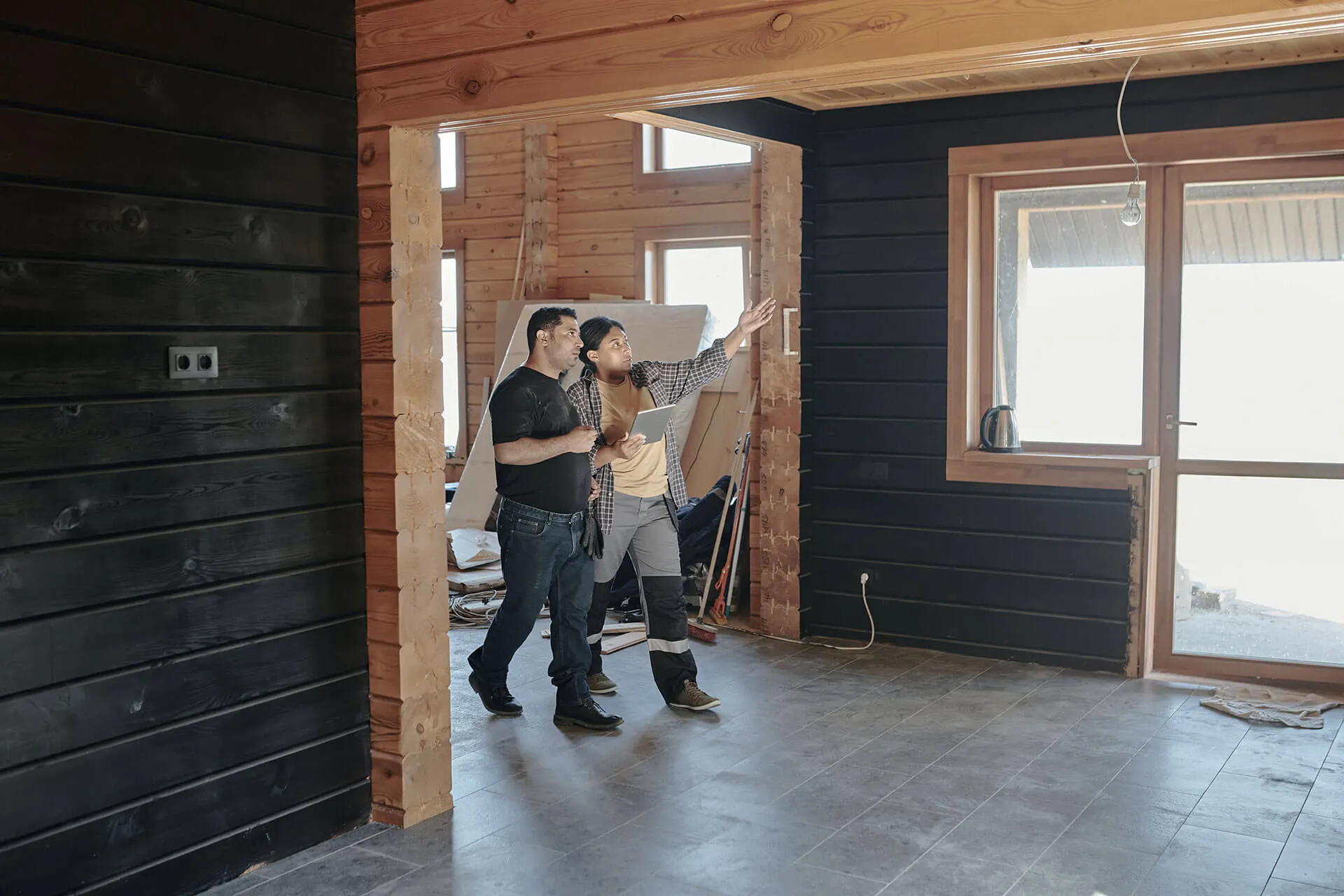 a couple of people standing in a room