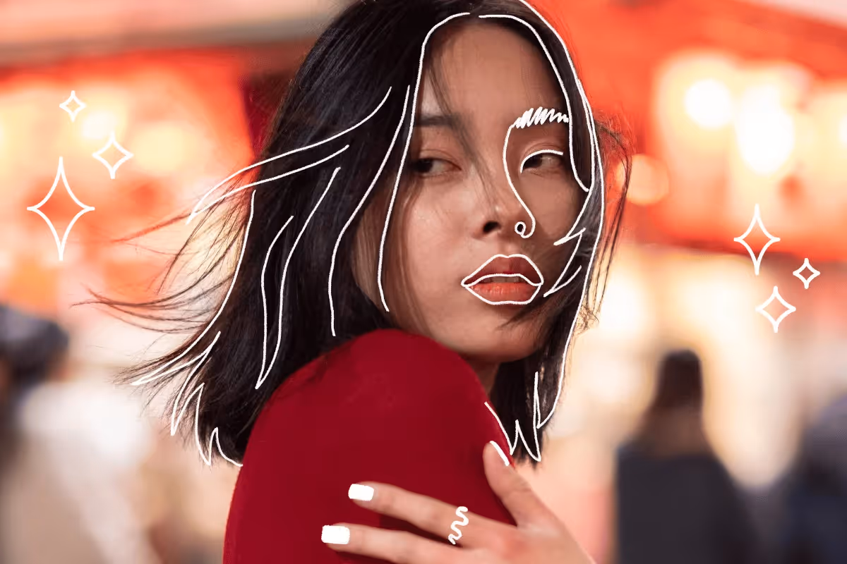 A woman with dark hair wears a red top with a thoughtful expression. White line art accents her features, set against a blurred, warm-toned background.