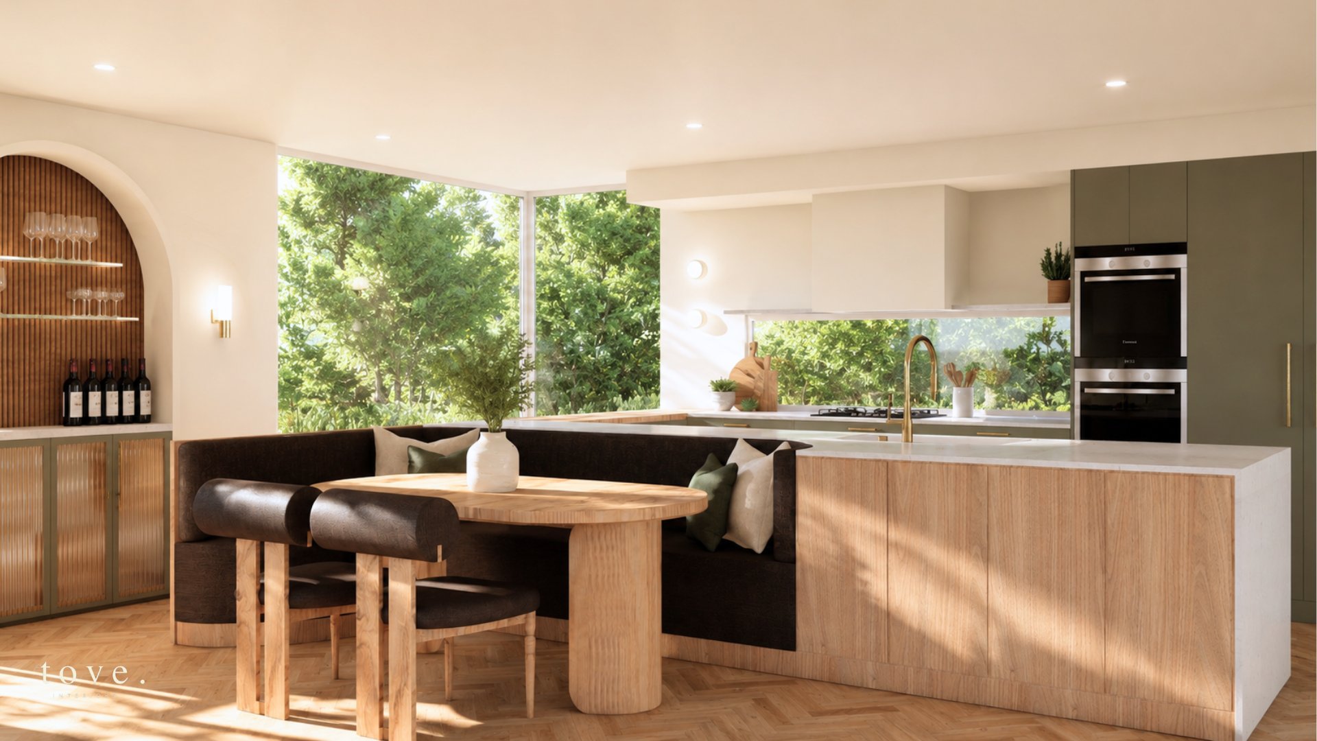 Keilor East kitchen with curved banquette and timber dining table