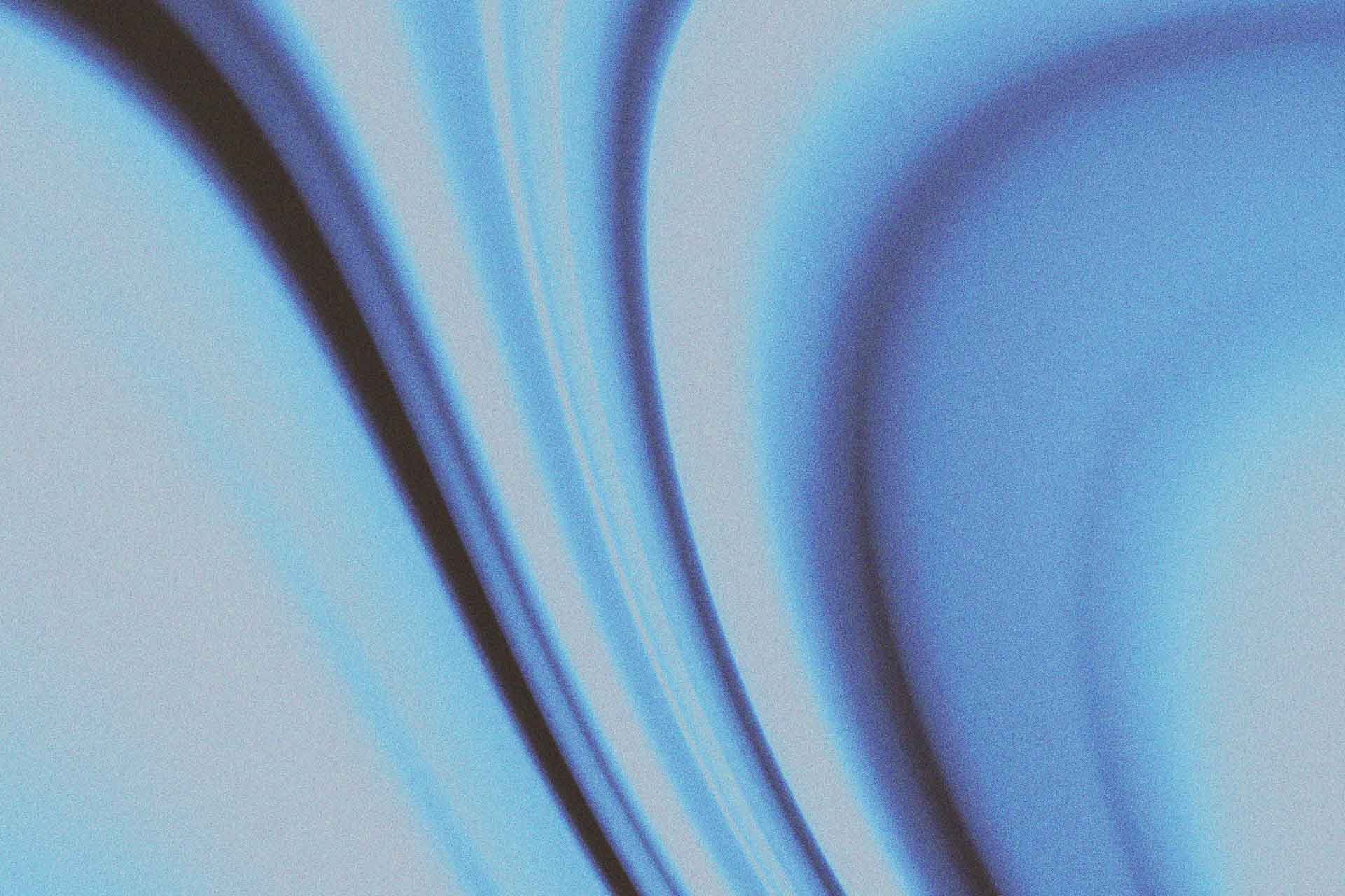 Abstract blue and violet gradient background with flowing light shapes.