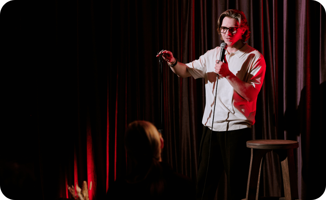 comedian telling jokes to crowd