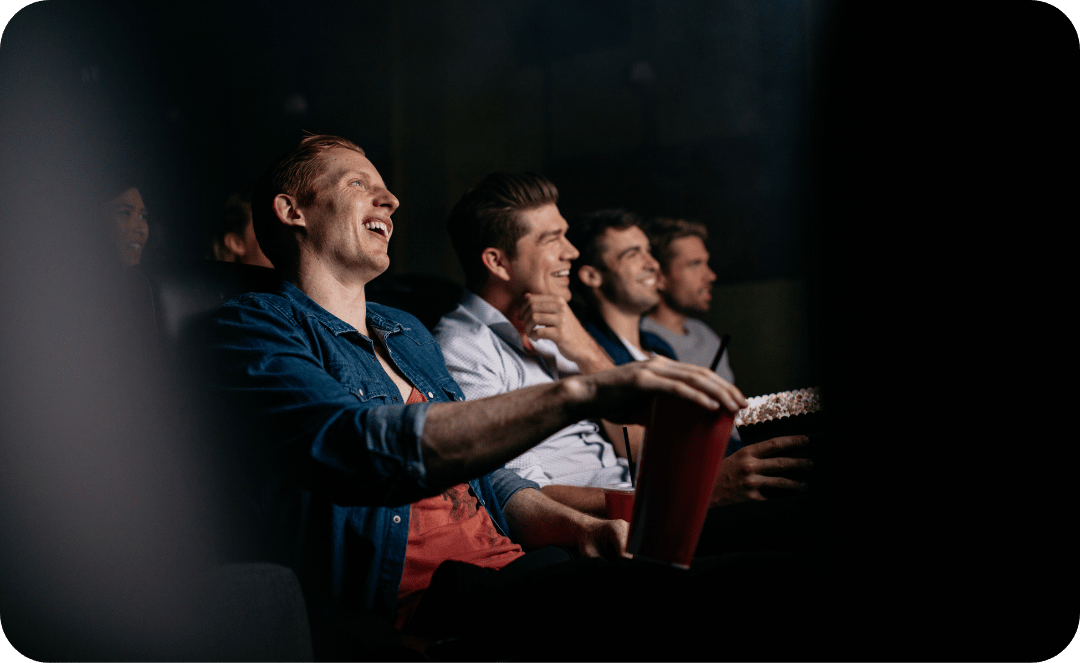crowd laughing at jokes