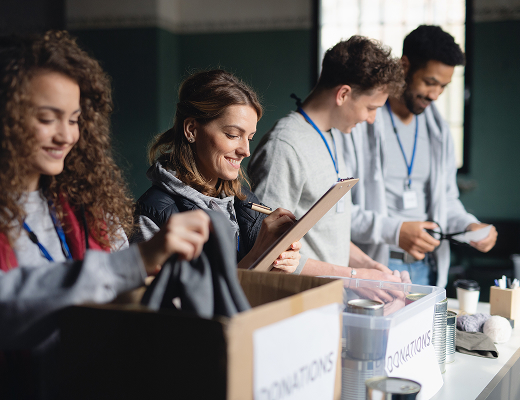 Volunteers packing charity boxes