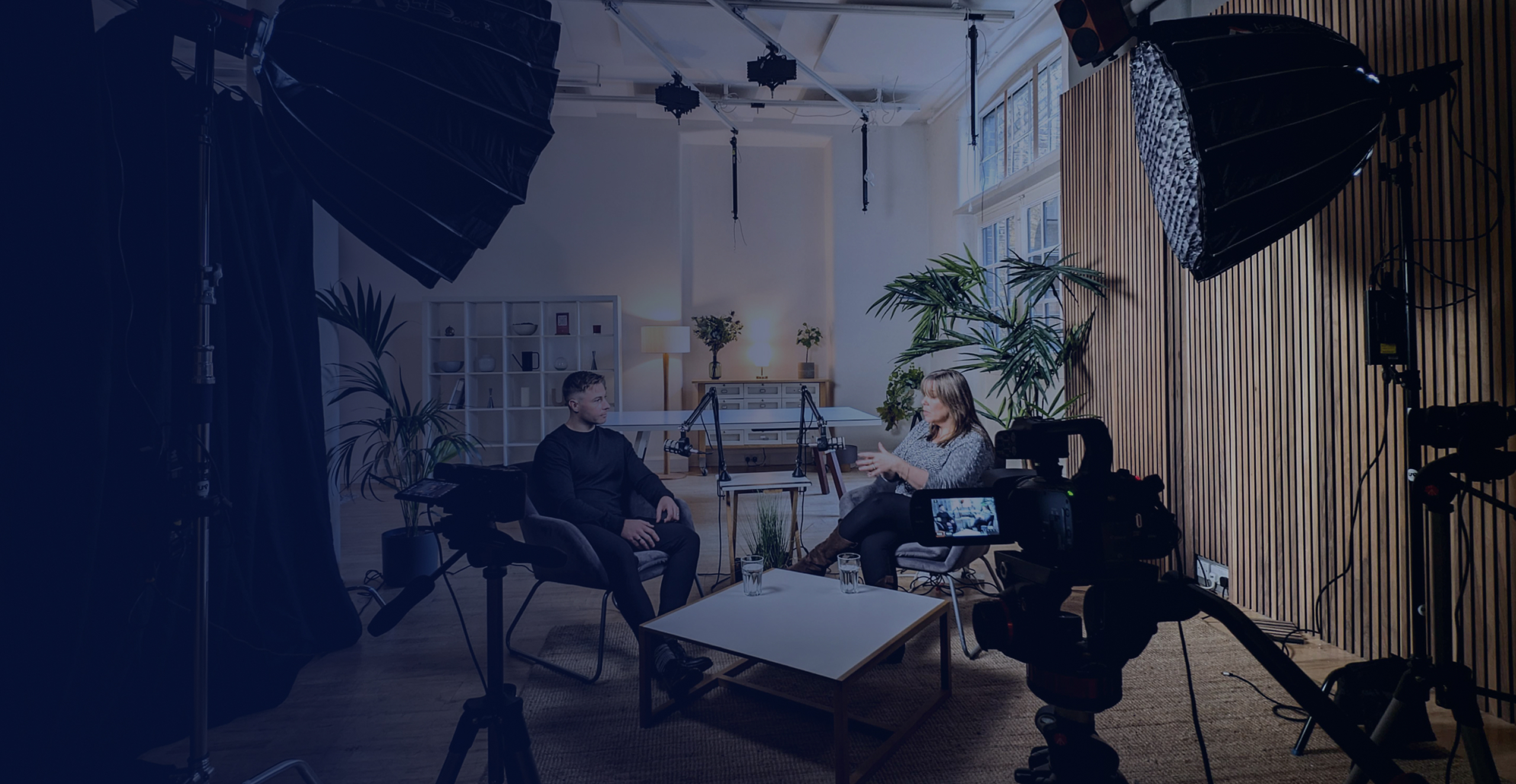 Explosive Brands founder Johnny with podcast guest in the studio