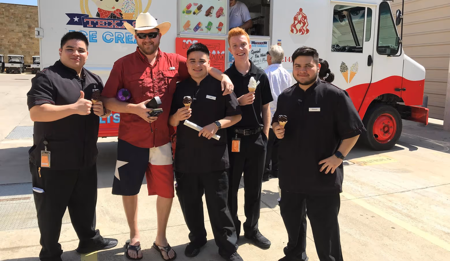 team members in front of ice cream truck