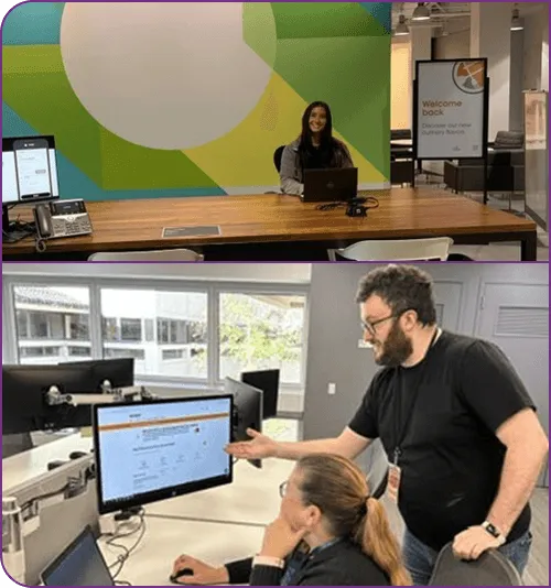 Employees working together and looking at computer screen.