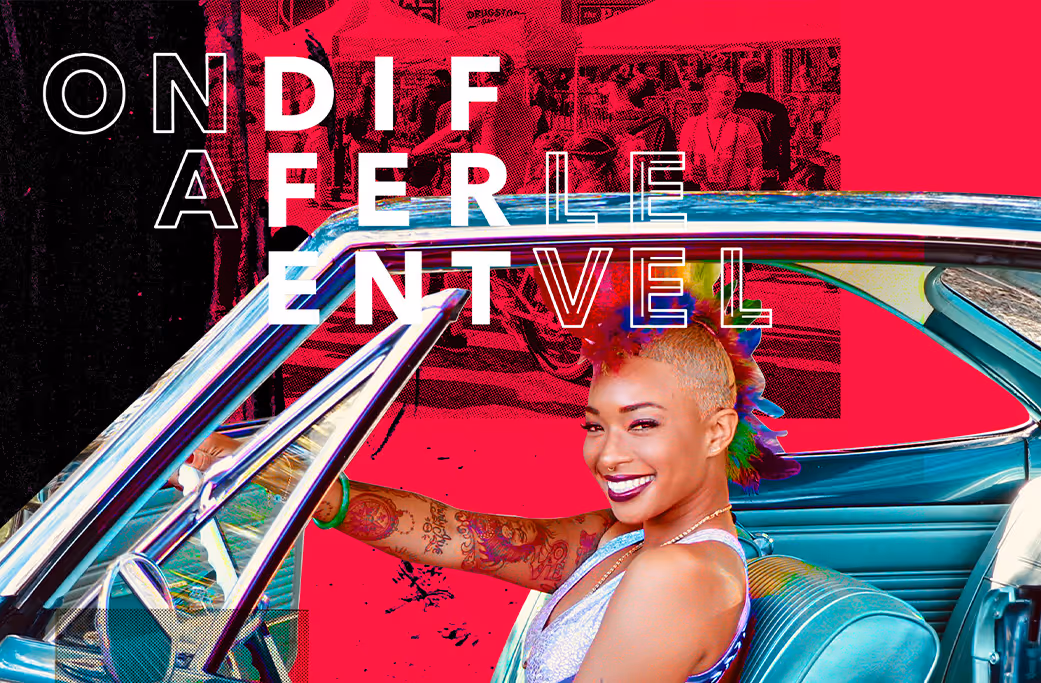 Women in car with multi-colored mohawk - image for discover atlanta
