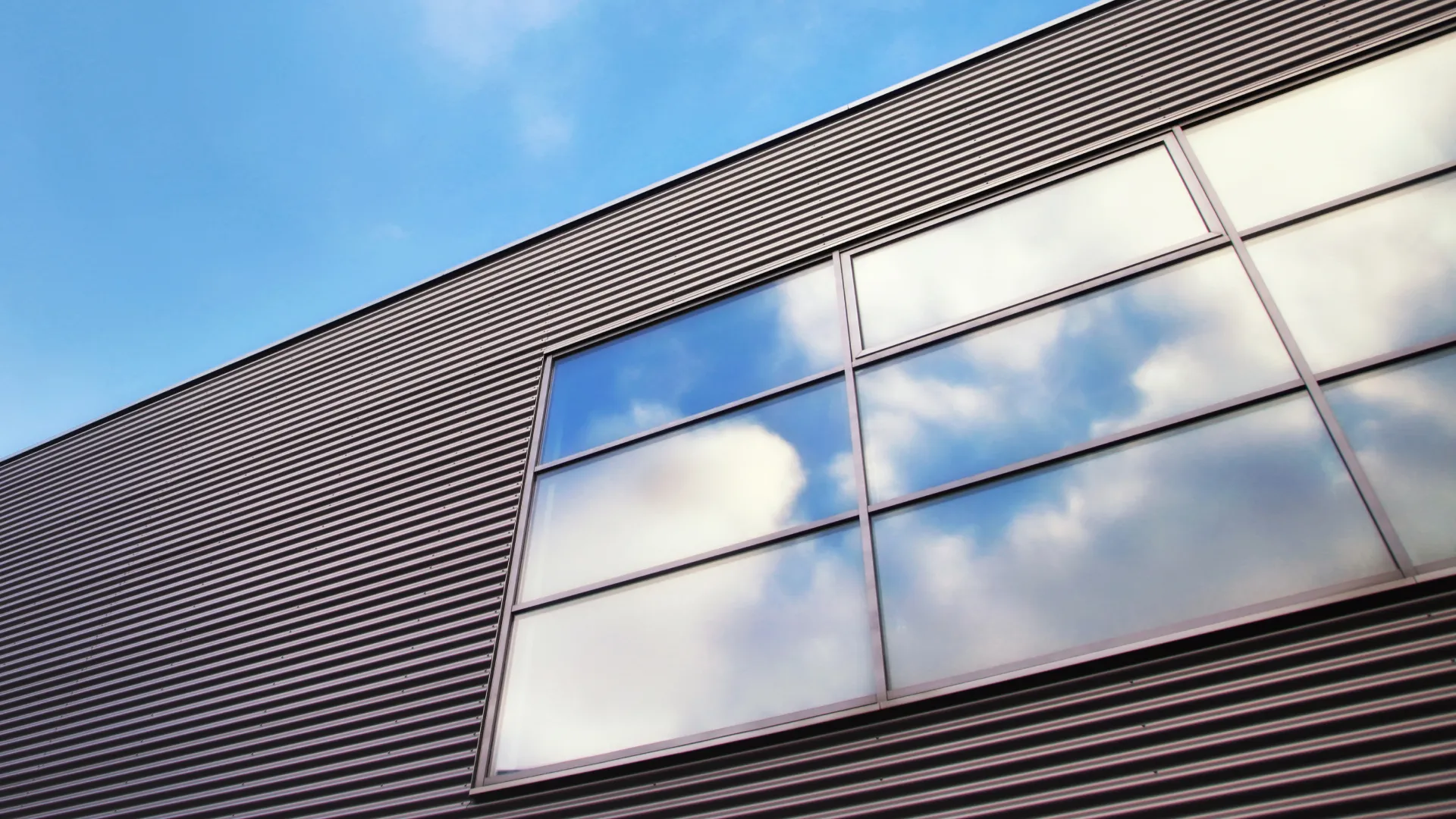 Warehouse external with blue sky