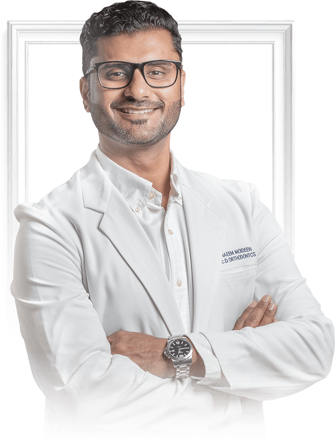 Picture of Dr. Naeem with a background frame