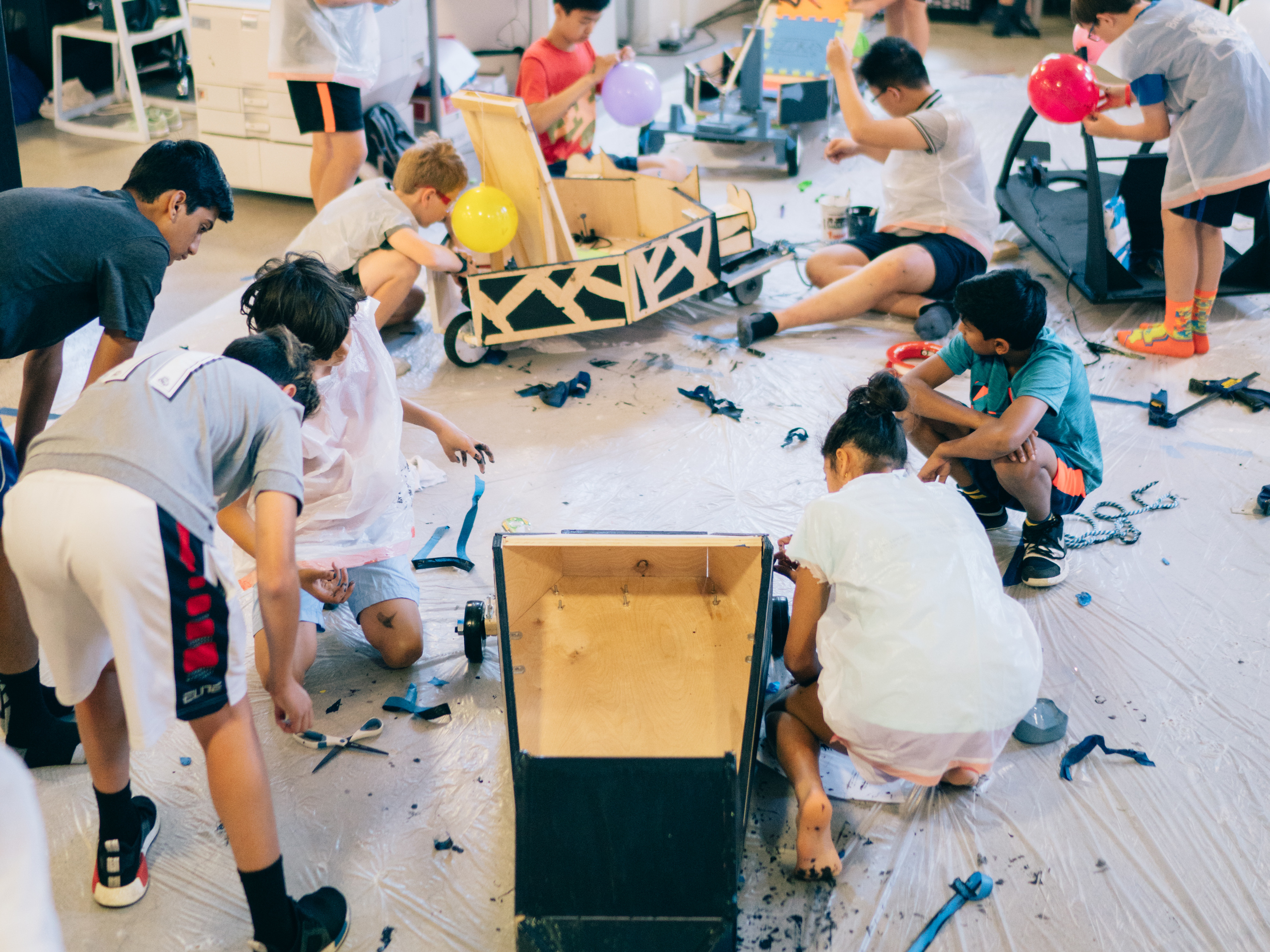 NuVu students collaborating on hands-on studio projects