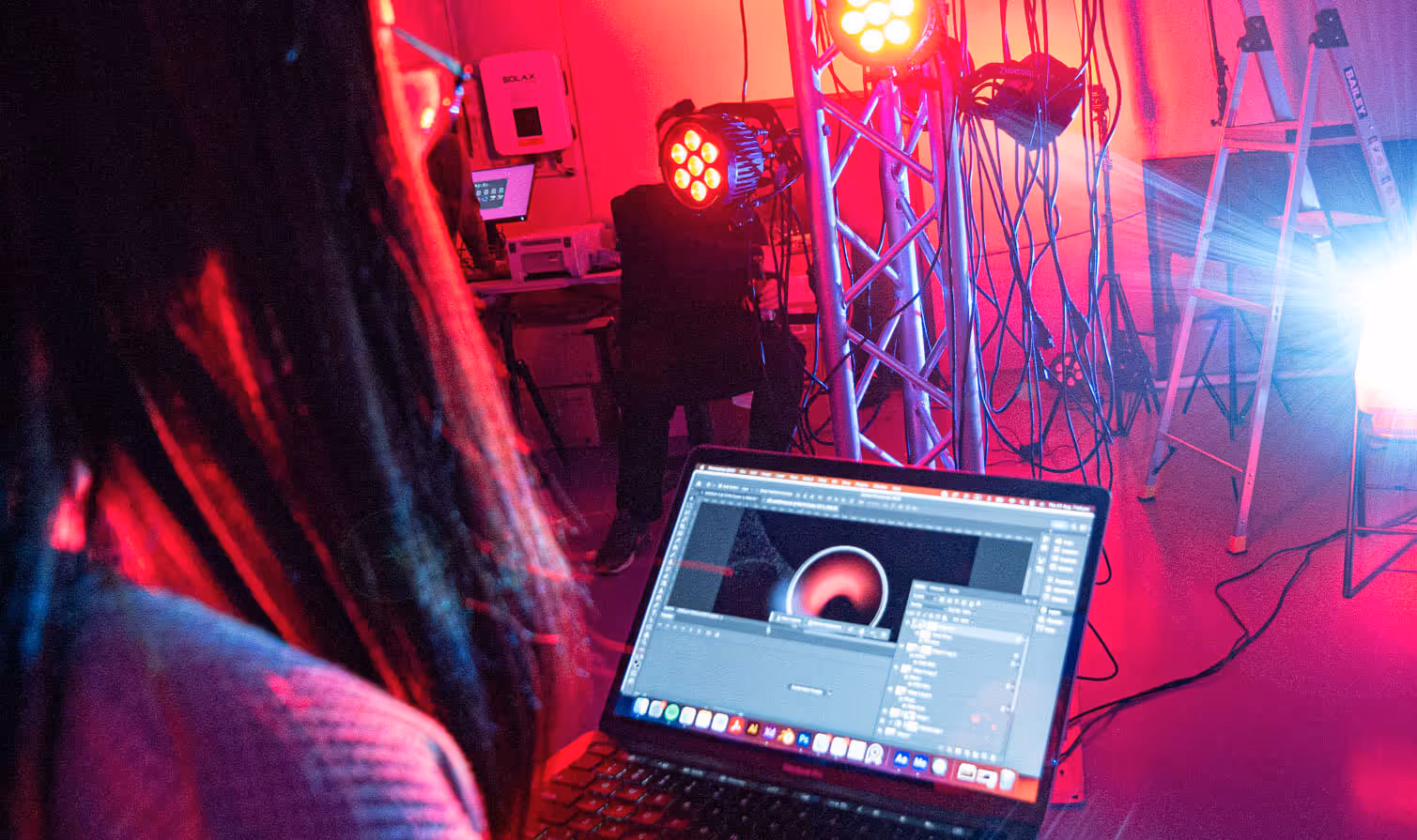 A film set with a computer and lights