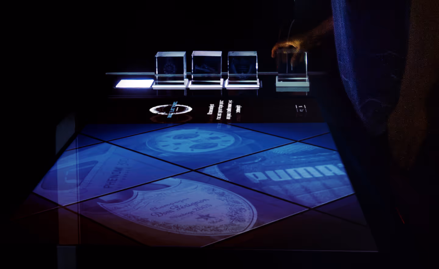 A person standing at an interactive screen.