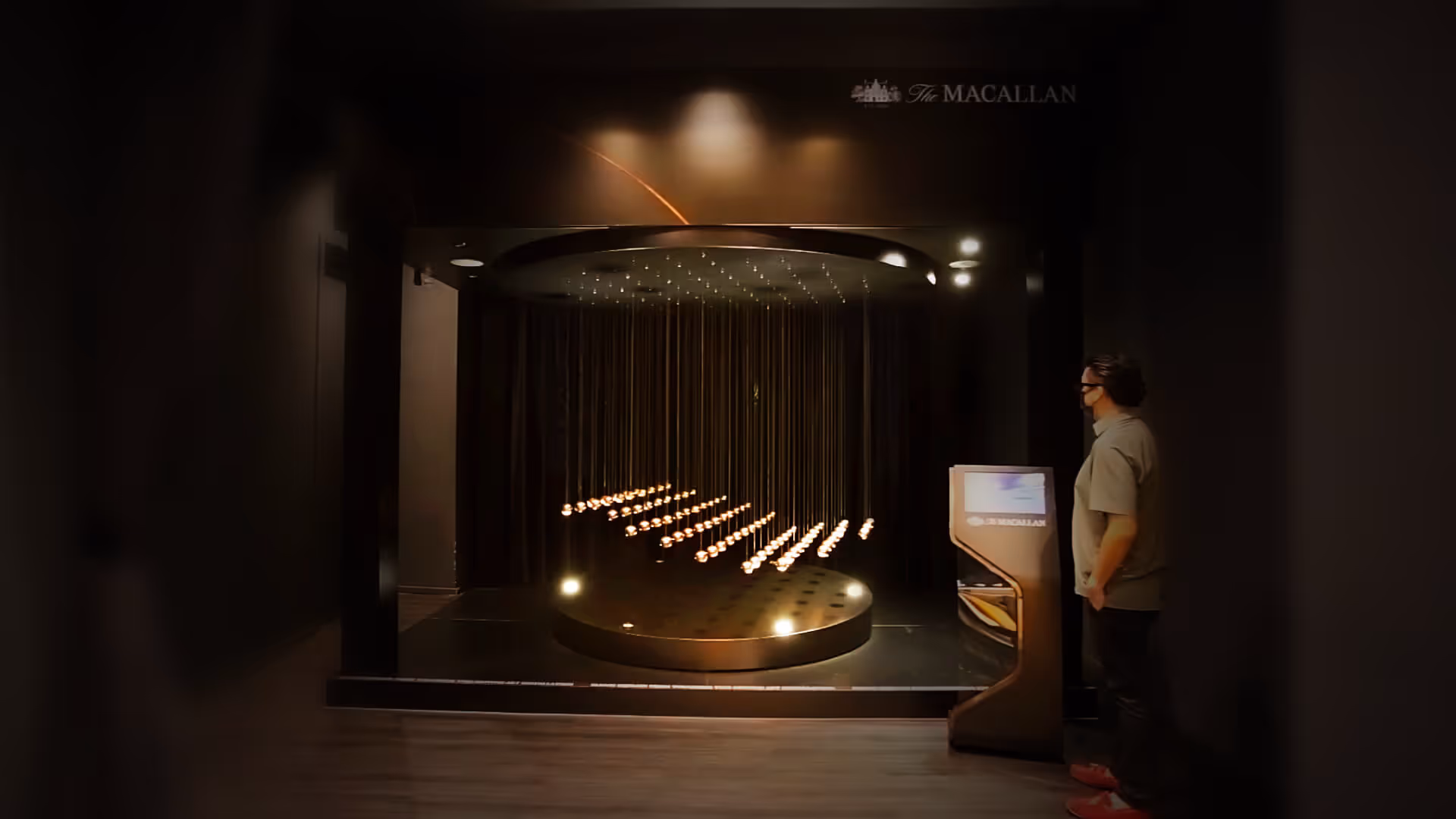 A person looking at an art installation.
