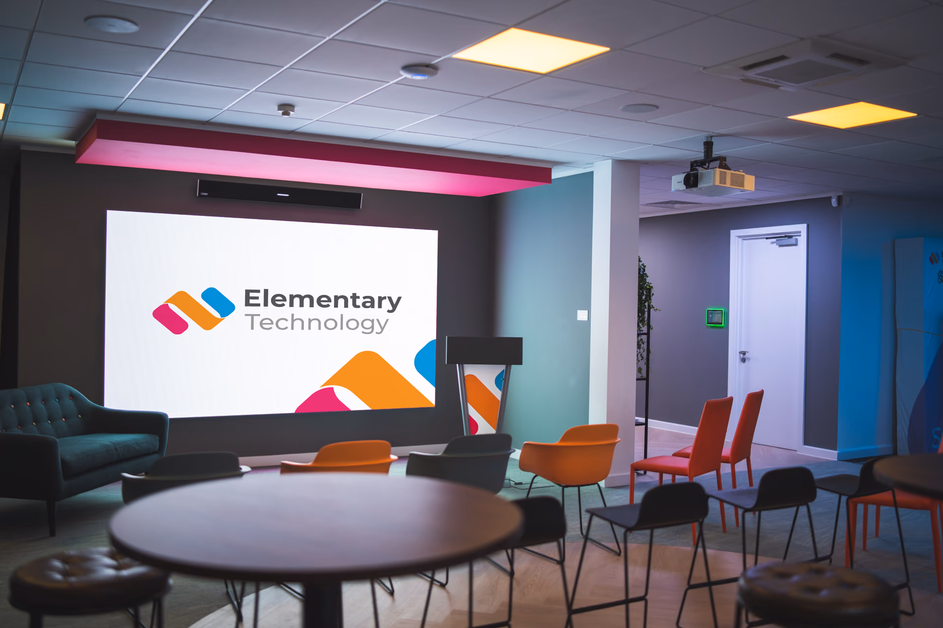 Our Experience Centre's Auditorium Zone setup ready to host a meeting with chairs facing the 135 inch LED wall