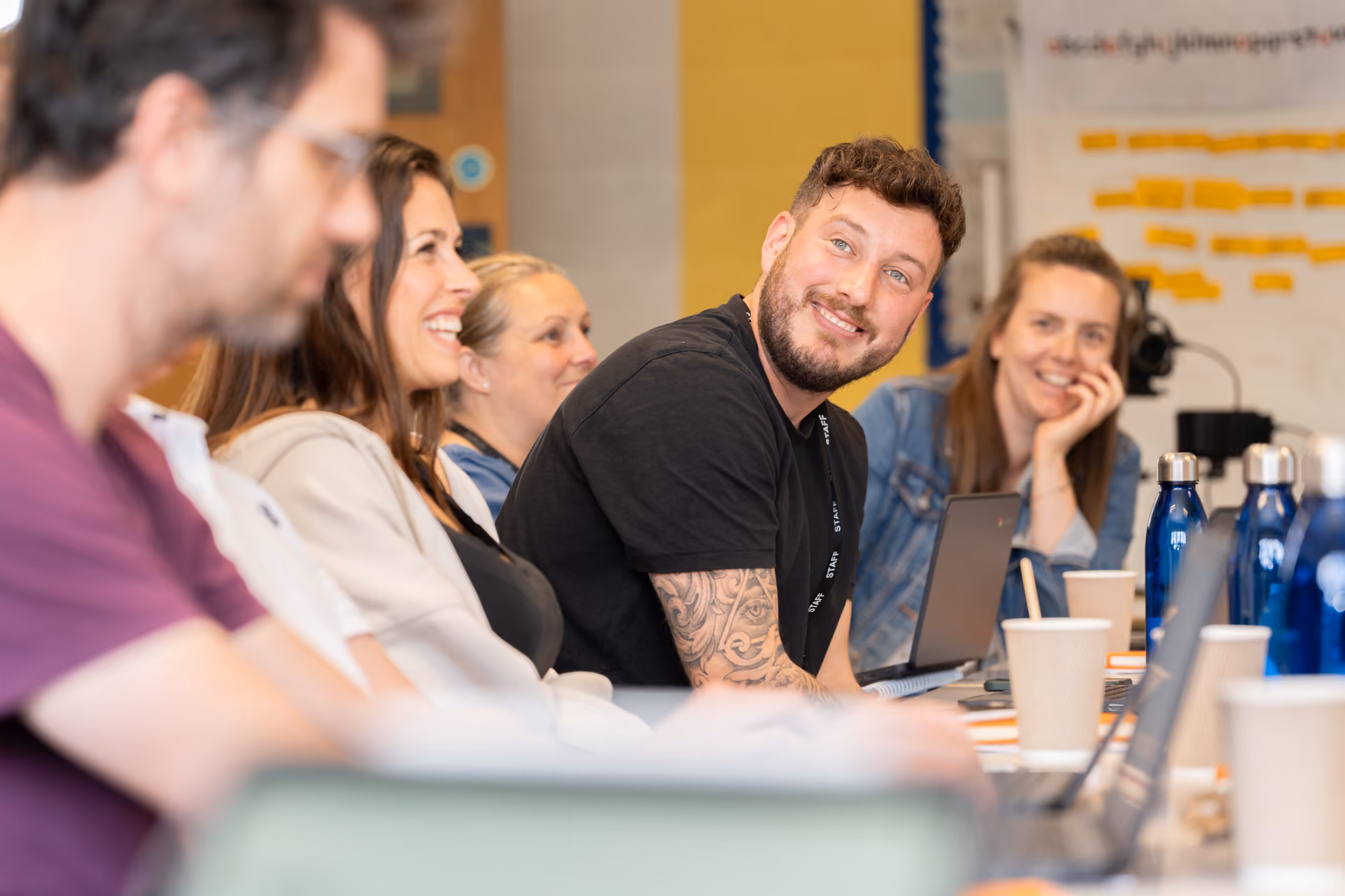 A group of teachers taking part in a Training session