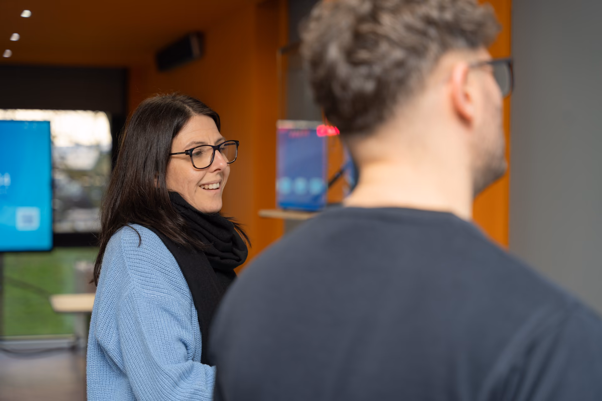 Man and woman looking at the SMART MX in Experience Centre