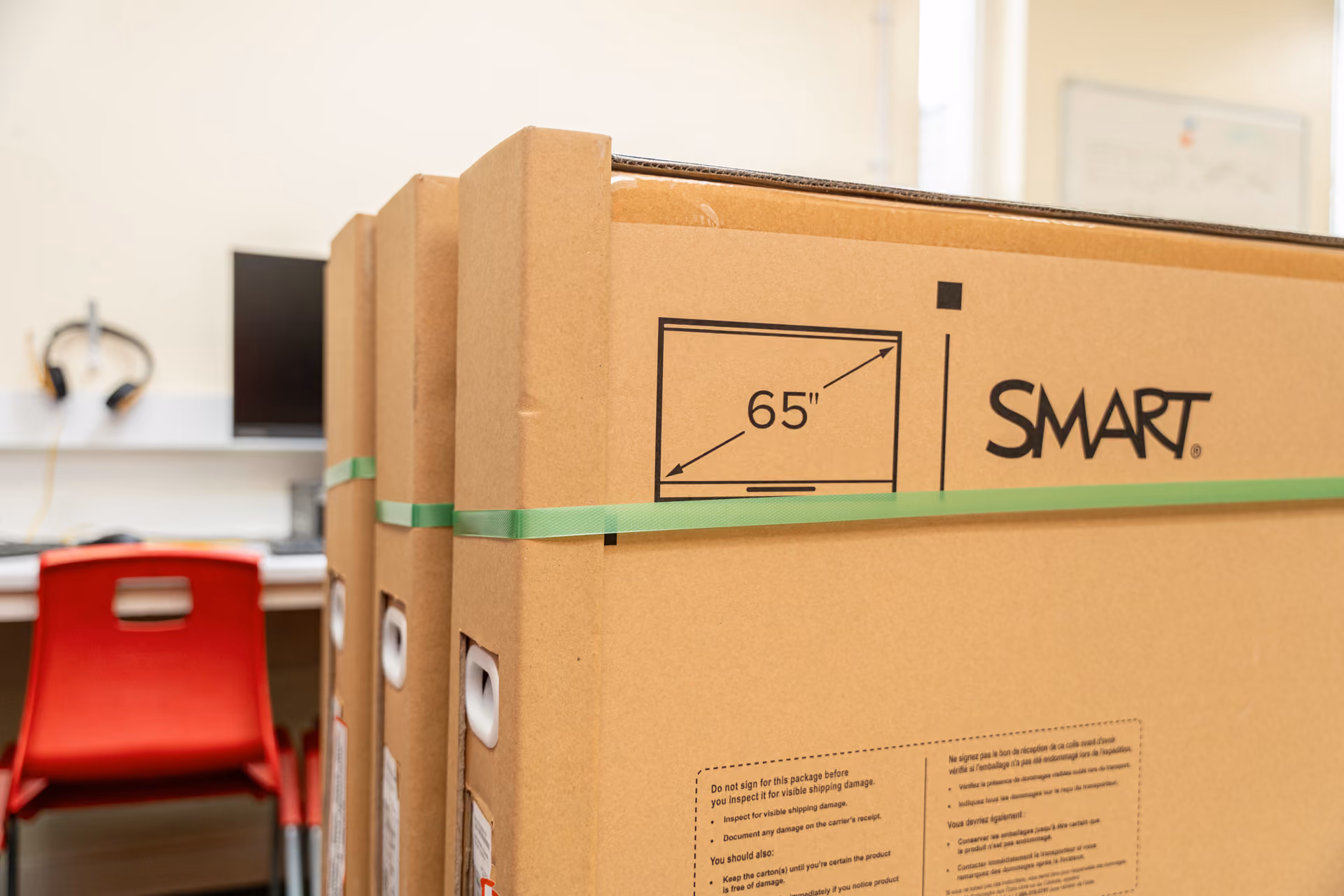 A large box that contains an Interactive Touchscreen from SMART technologies