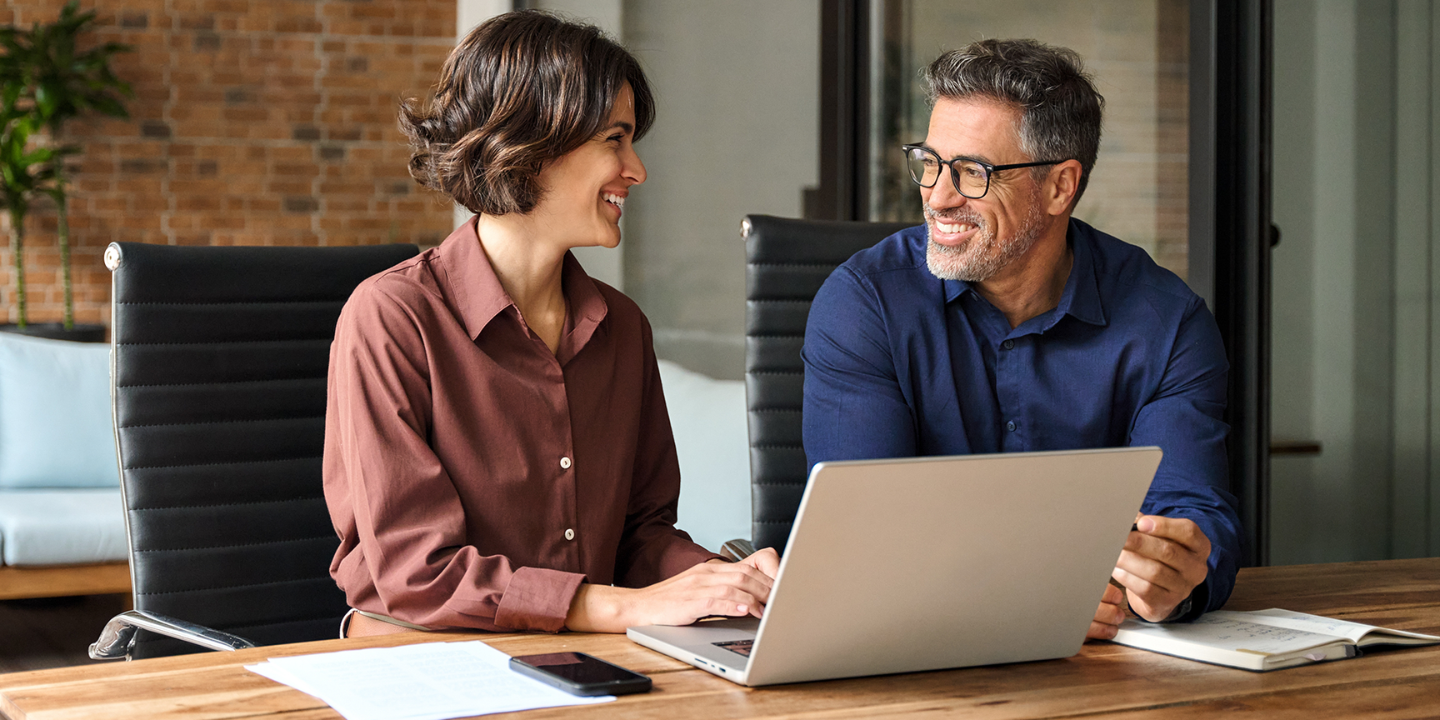 A financial adviser and a happy client