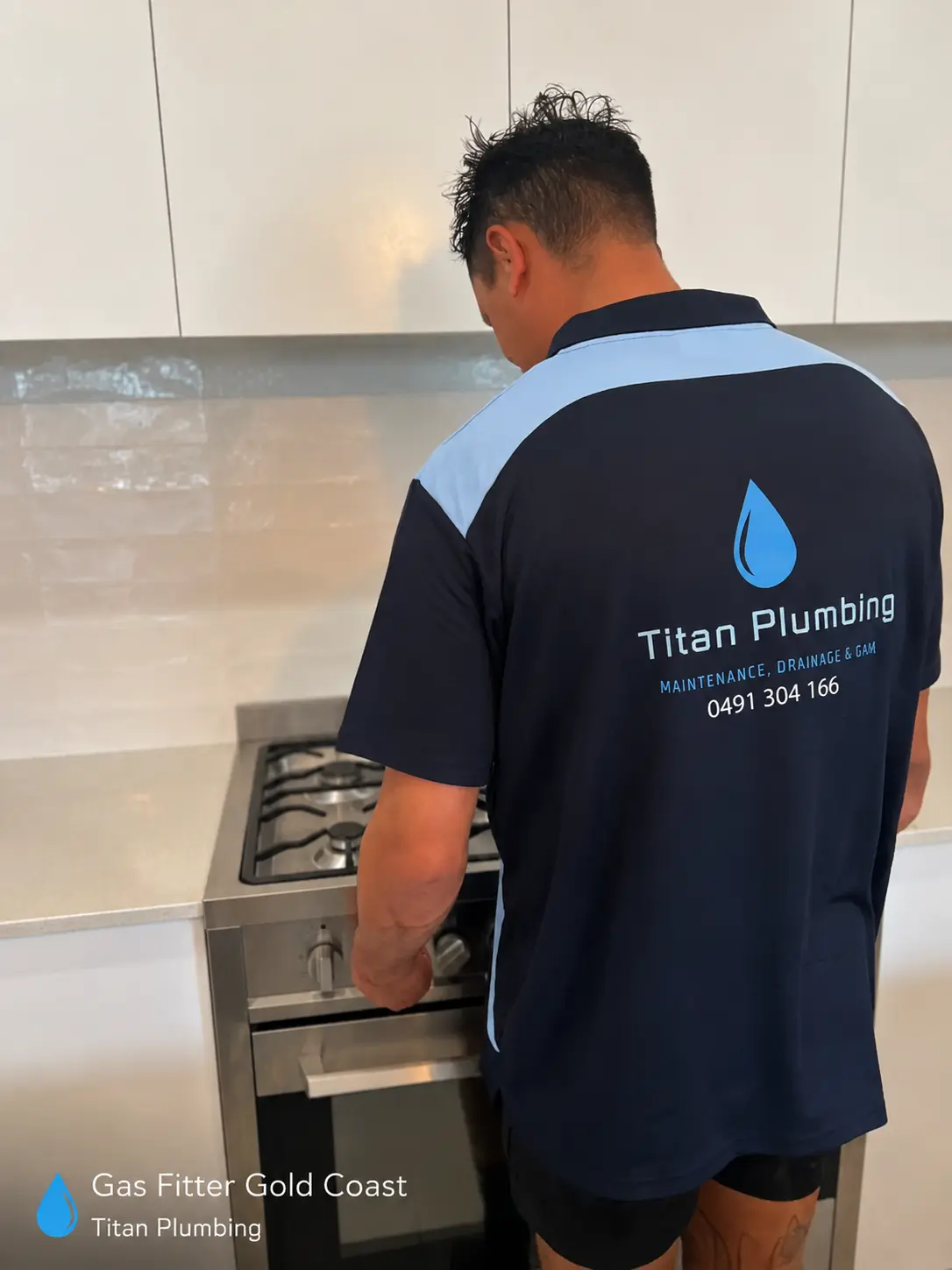 Titan Plumbing gas fitter installing a stove on the Gold Coast