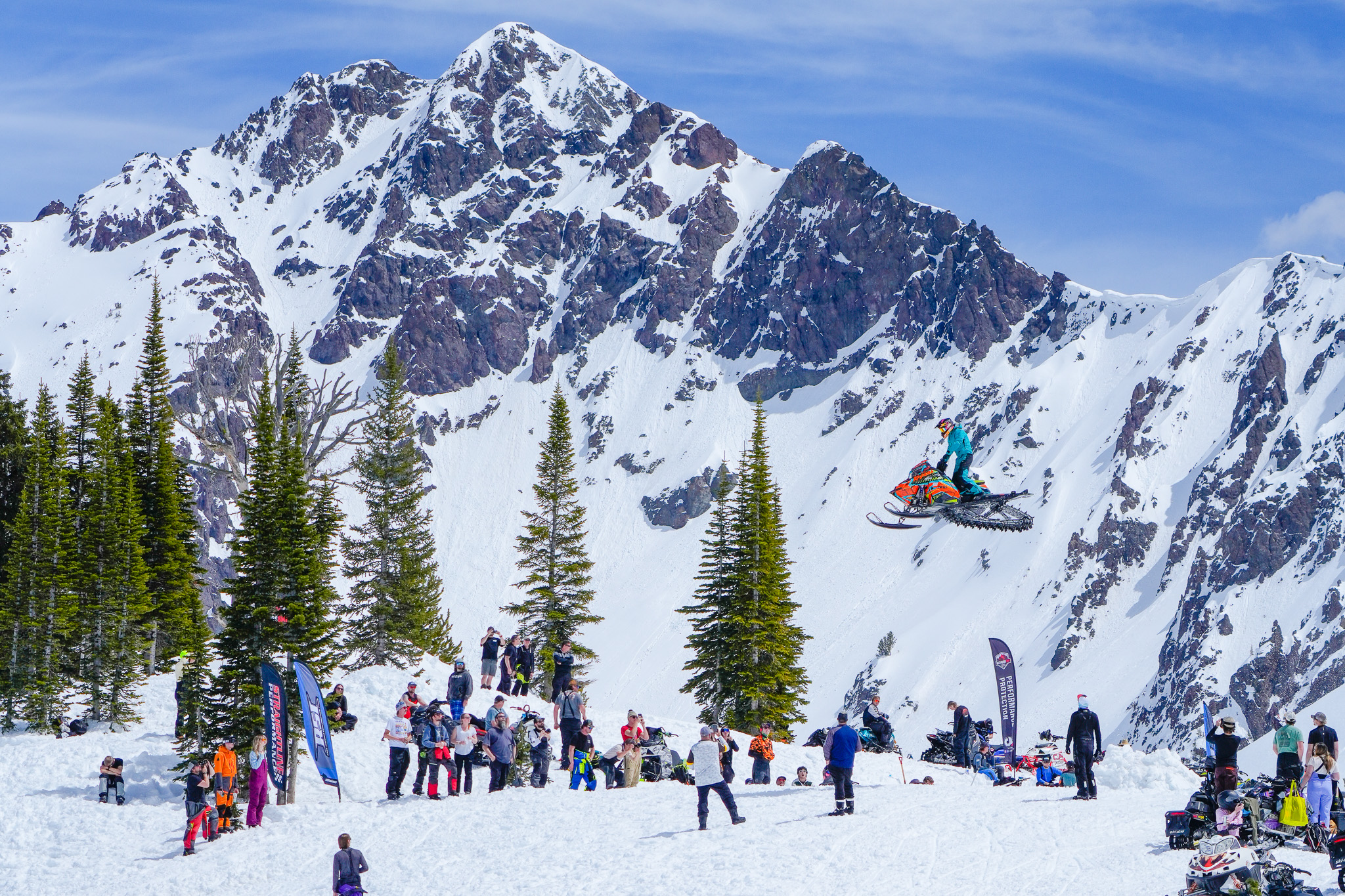 snowmobile jump over mountain