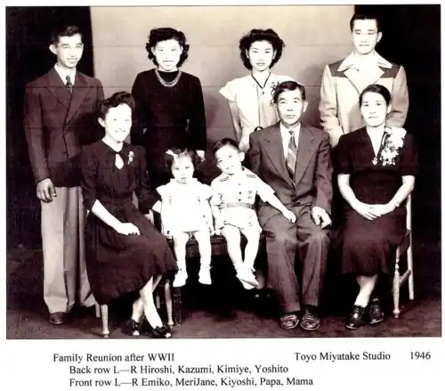 A three-year-old Kiyoshi Kuromiya seated with his Japanese American family in 1946.