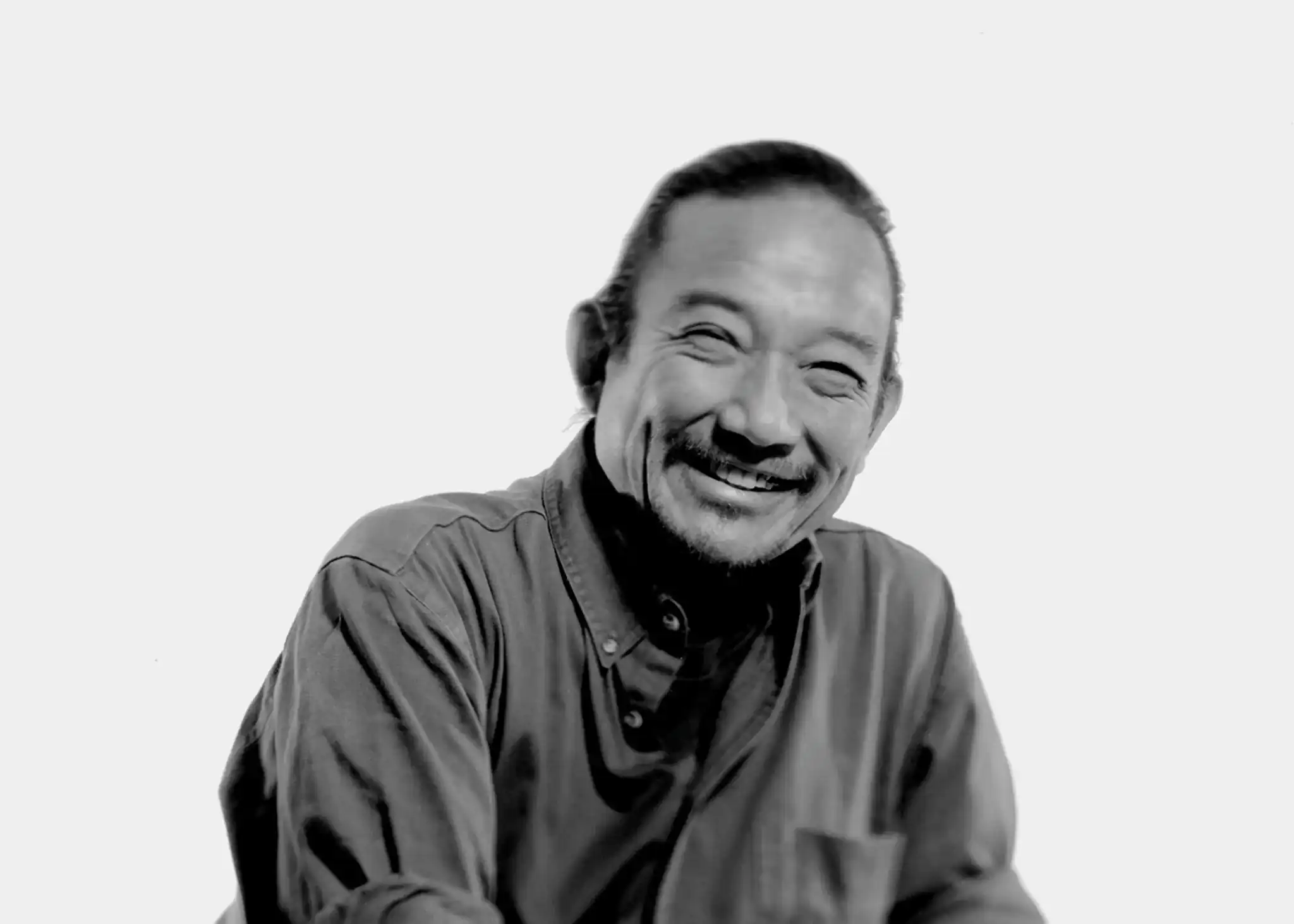 Portrait of activist Kiyoshi Kuromiya with a soft background