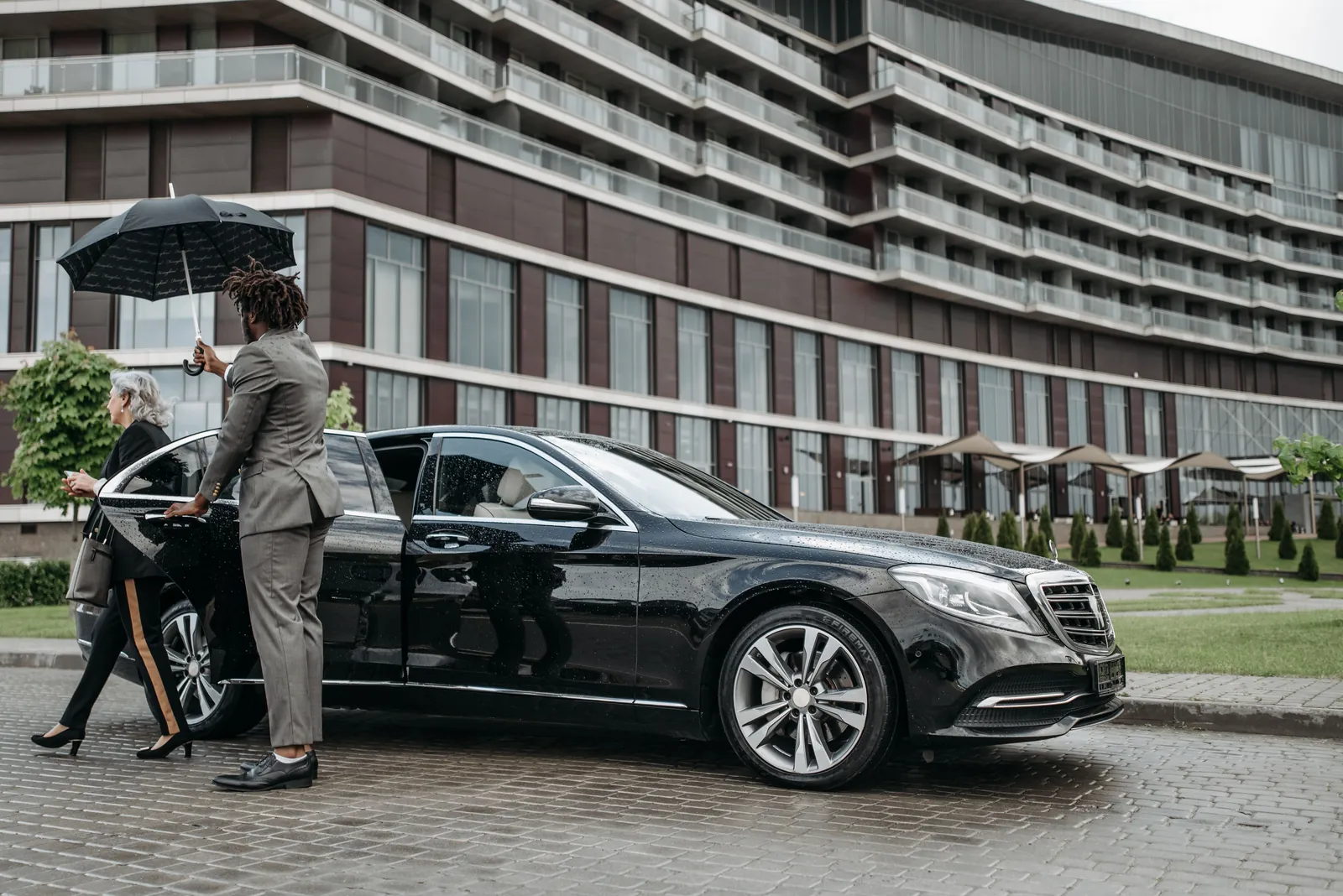 Discreet protected arrival with private chauffeur and security
