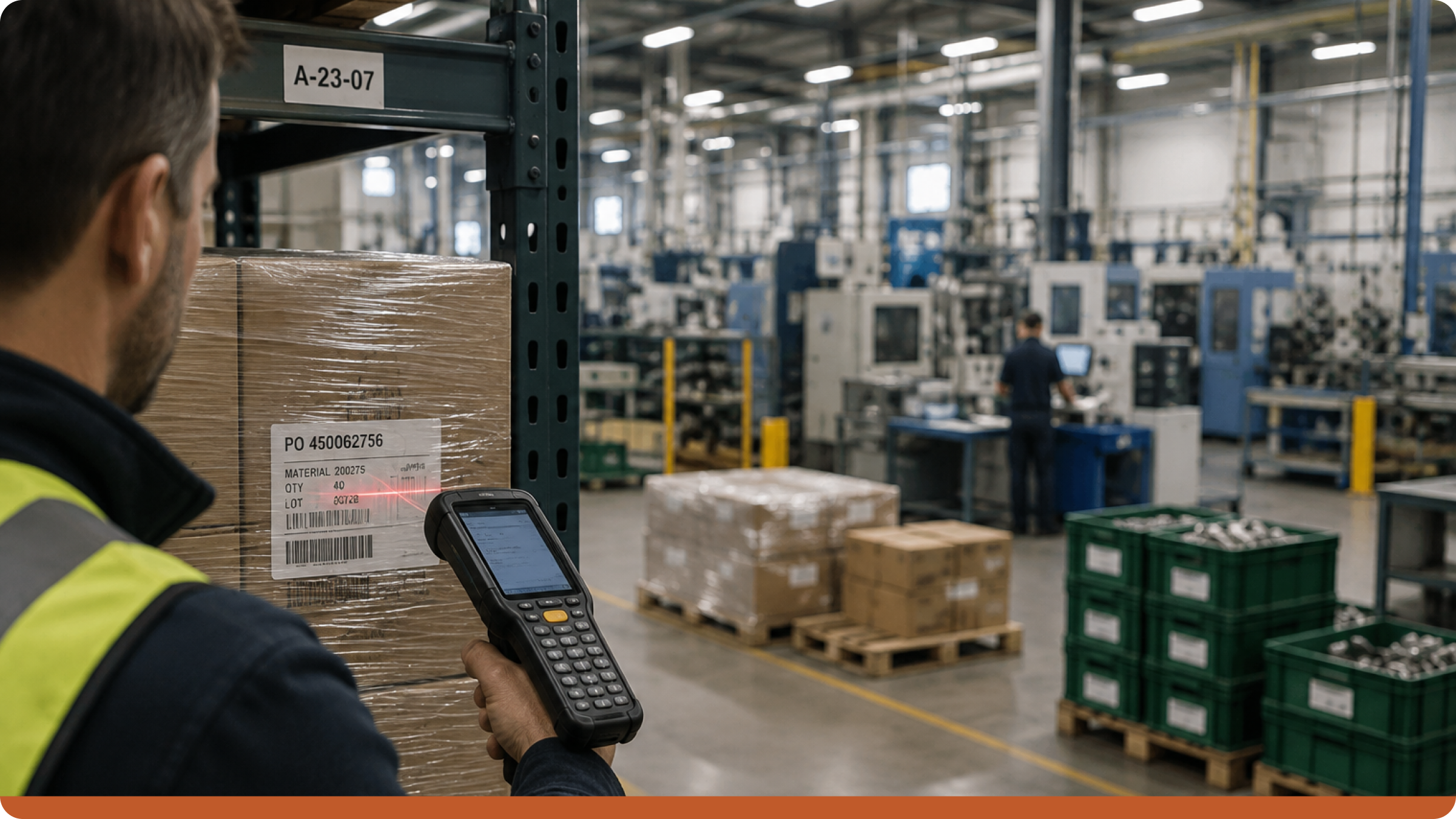 Warehouse worker scanning a pallet on the production floor, illustrating warehouse management software and WMS vs ERP for manufacturing.