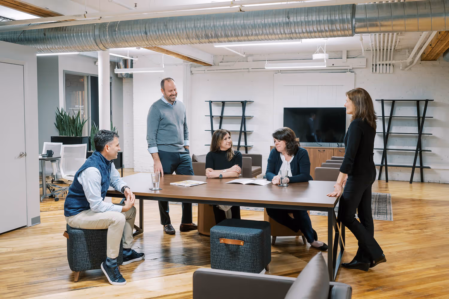 VIUM Capital meeting in office, financial