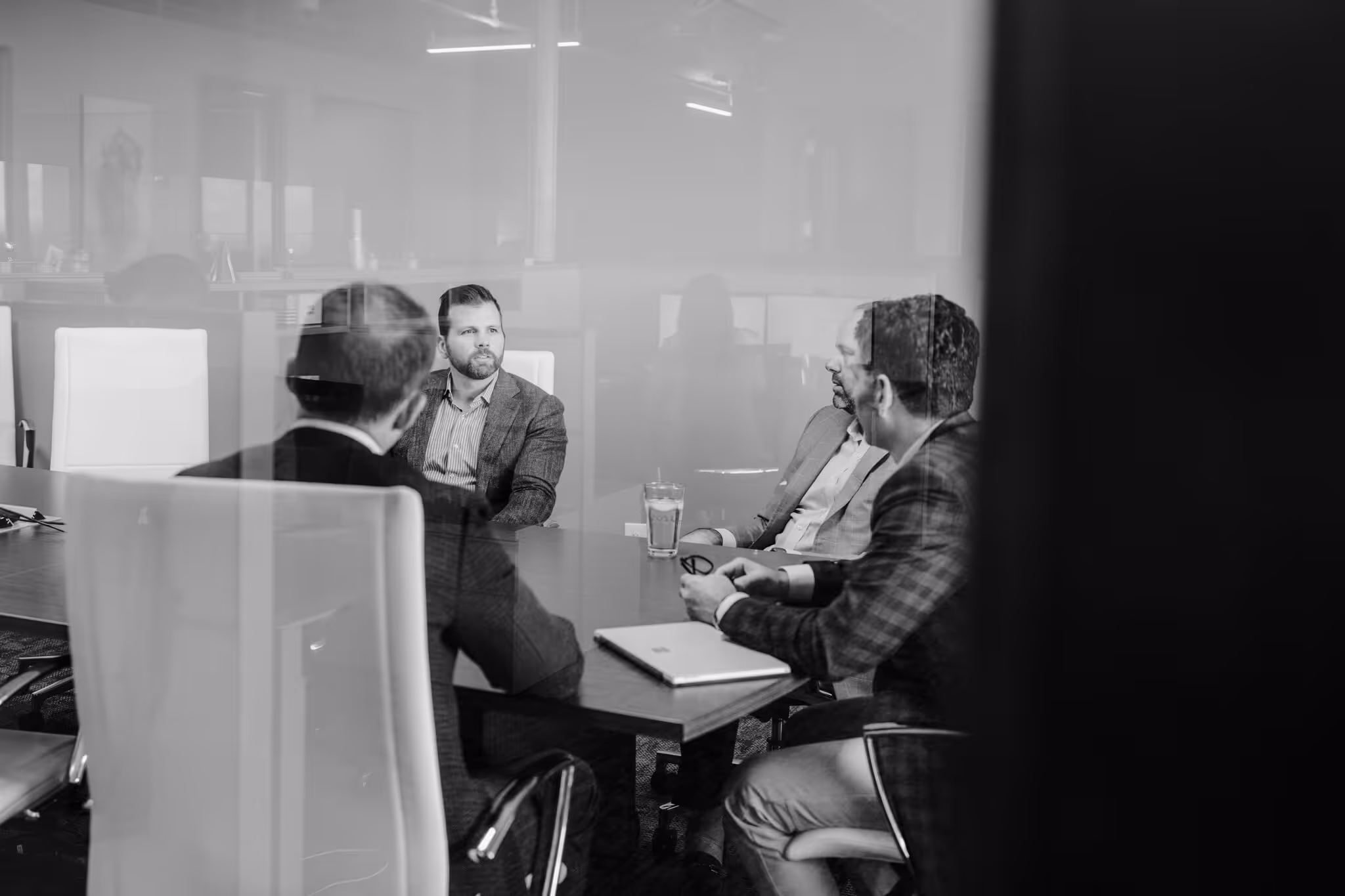 VIUM Capital office meeting, financial discussion, capital expenditures 