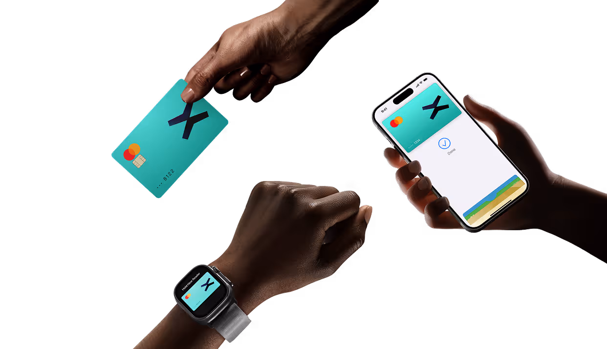 Hands holding a teal Mastercard credit card, a smartphone displaying the same card in a digital wallet app, and a smartwatch showing the card on its screen against a black background.
